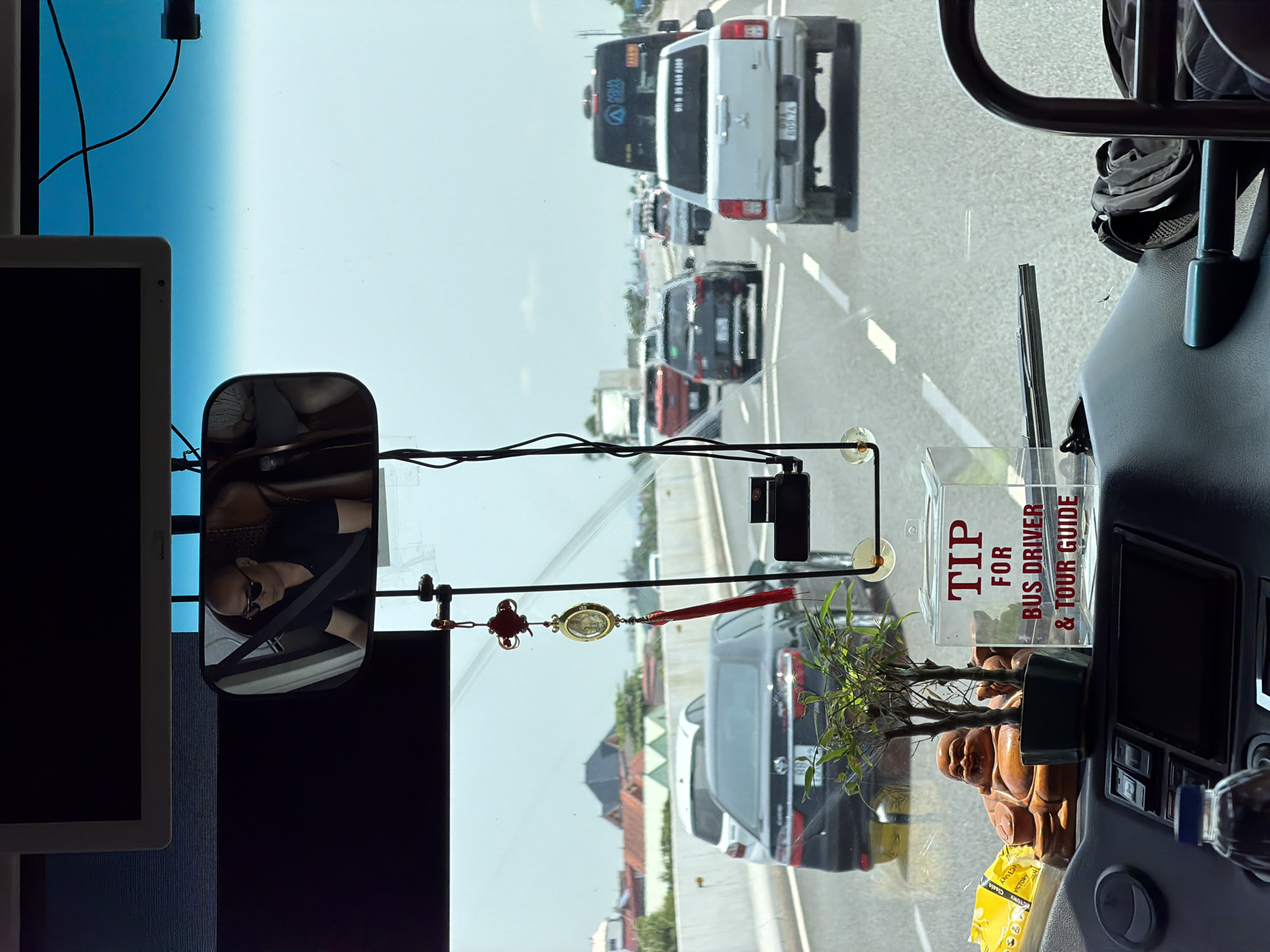 Bus passenger documents highway travel through Hải Phòng, Vietnam