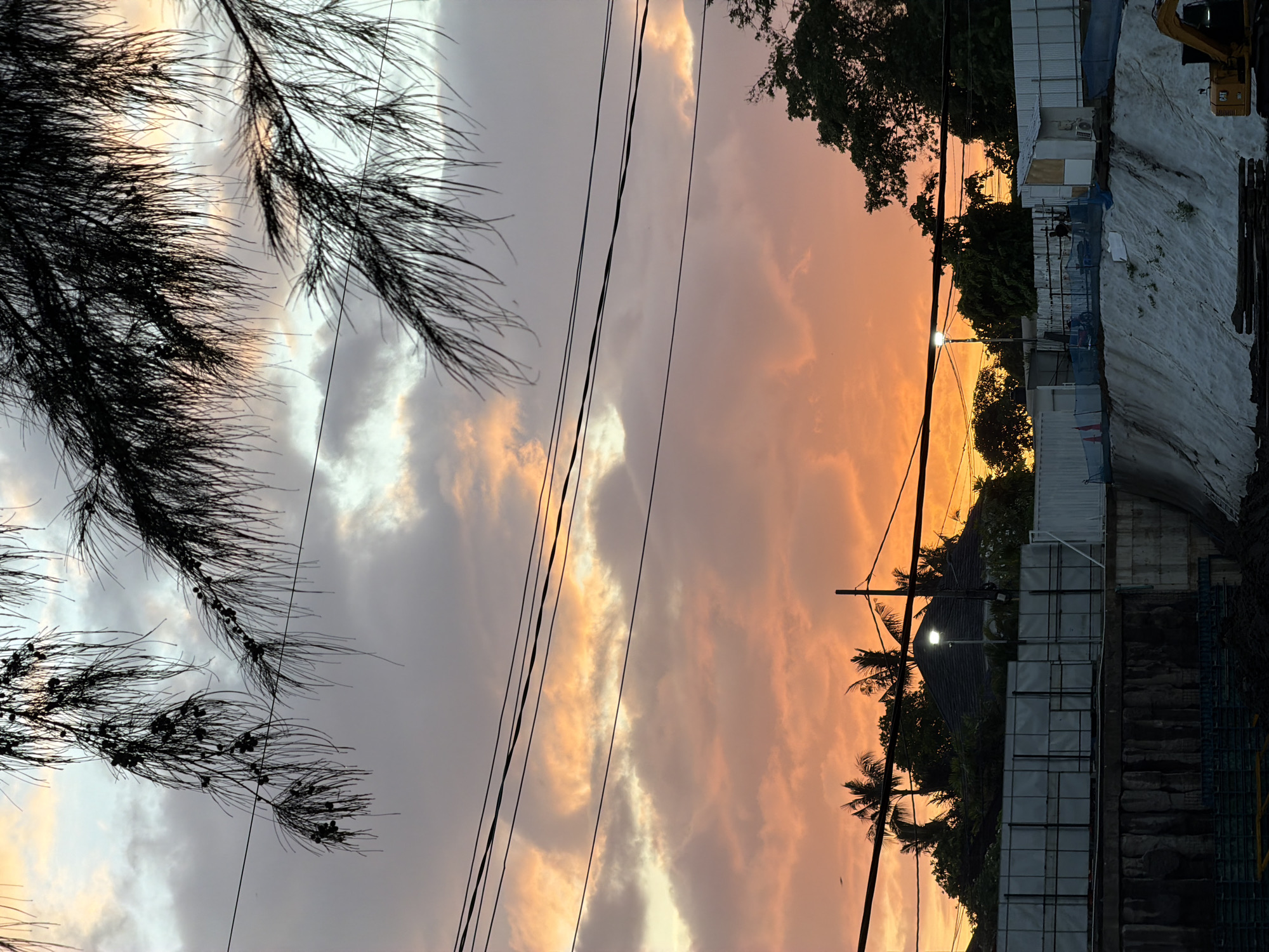 Sunset observed in Mengwi, Indonesia with beachgoer present