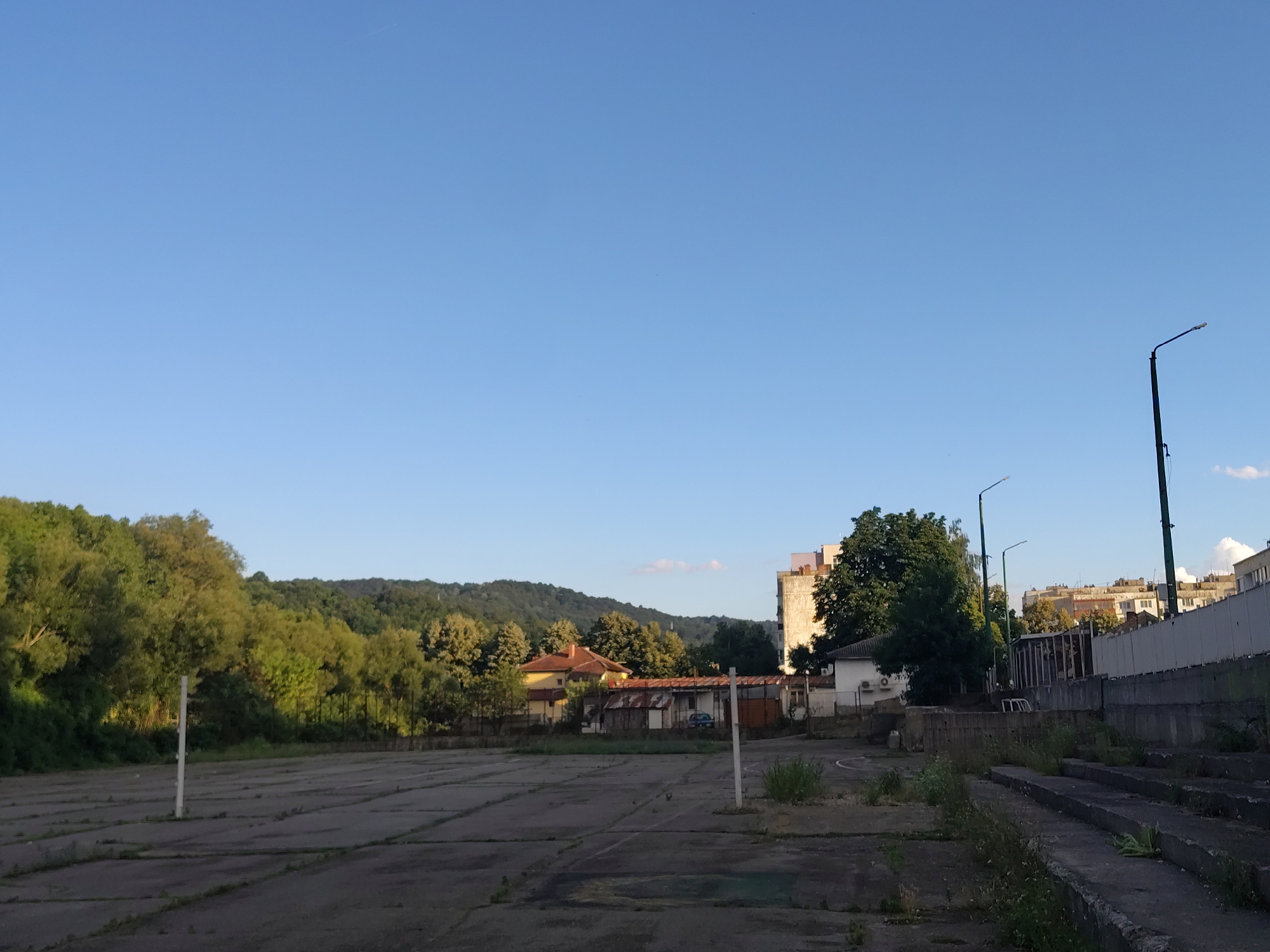Worn outdoor basketball court in Gabrovo, Bulgaria