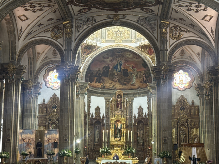 Tourist documents Mexico City churches and landmarks over afternoon