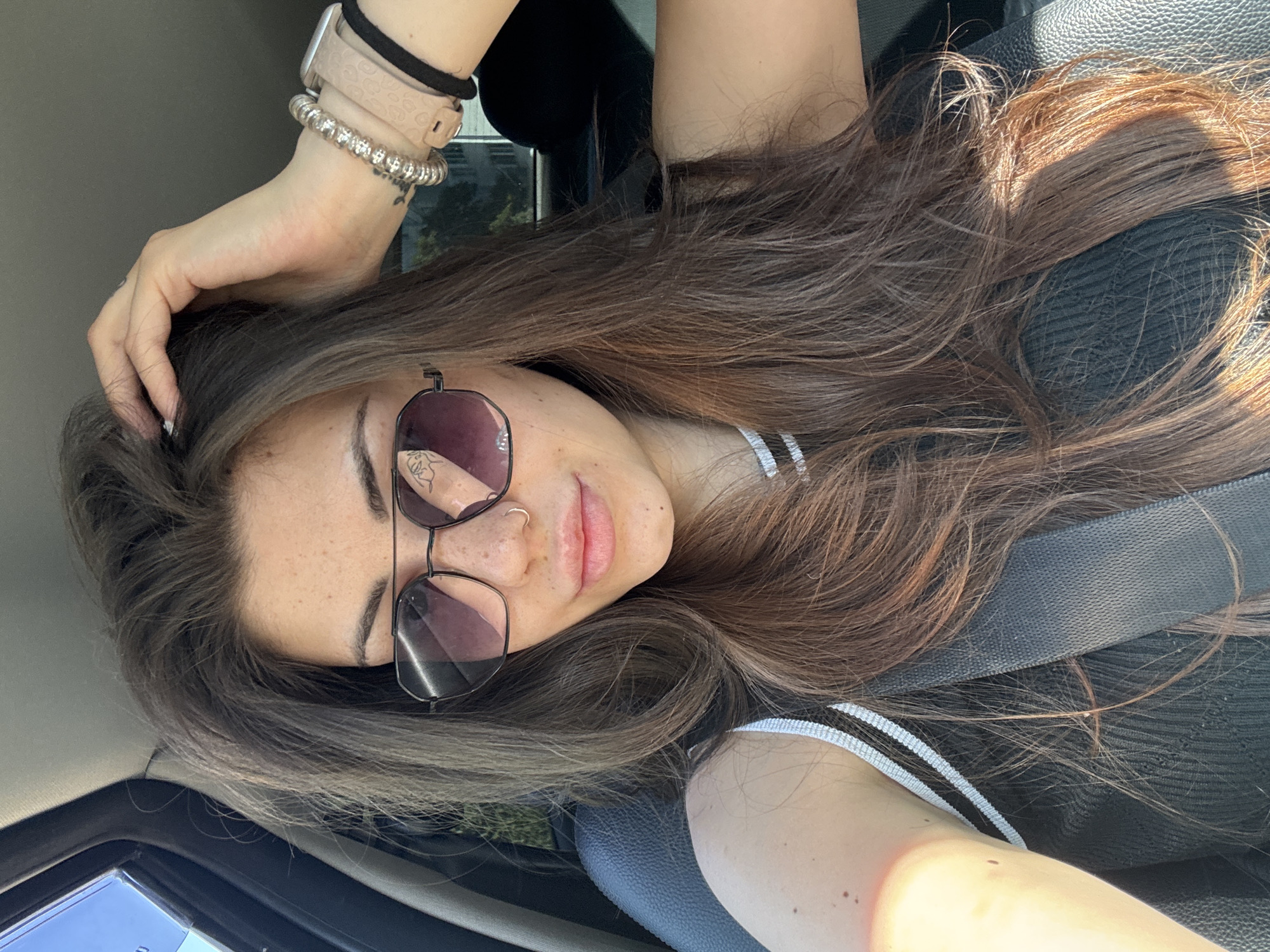 Woman photographed in passenger seat of car in Sofia
