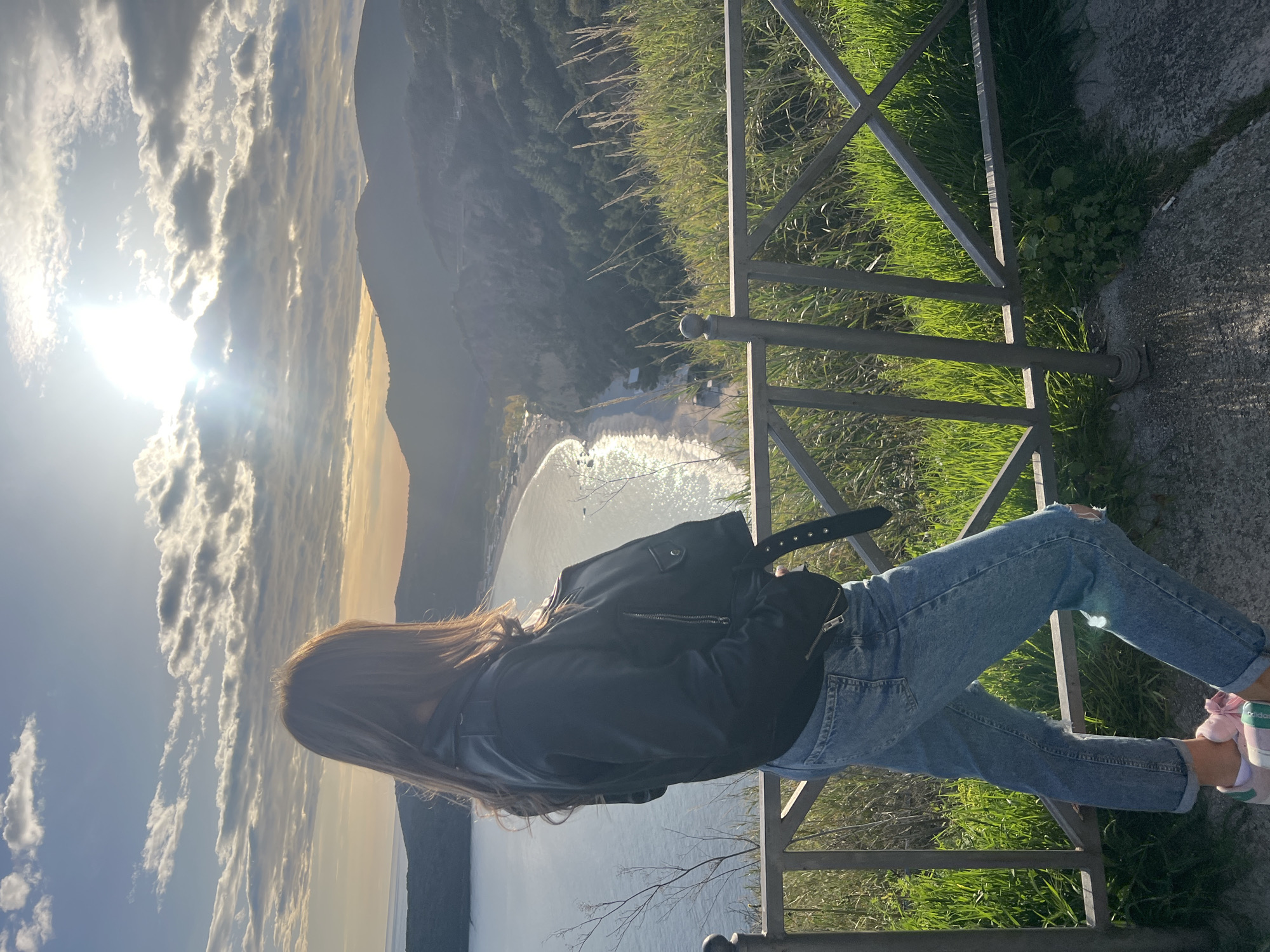 Woman poses for photos at scenic Prijevor coastal overlook