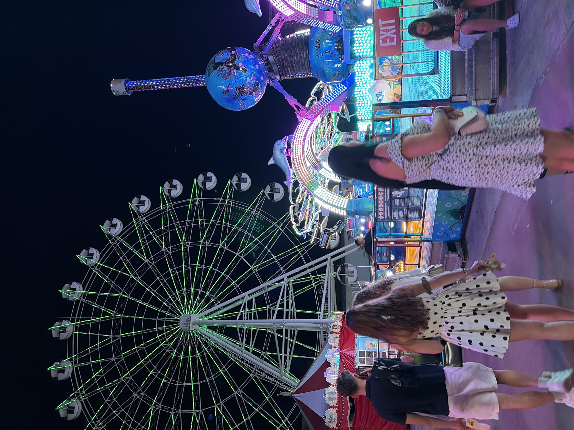 Nesebar amusement park lit up on a summer night