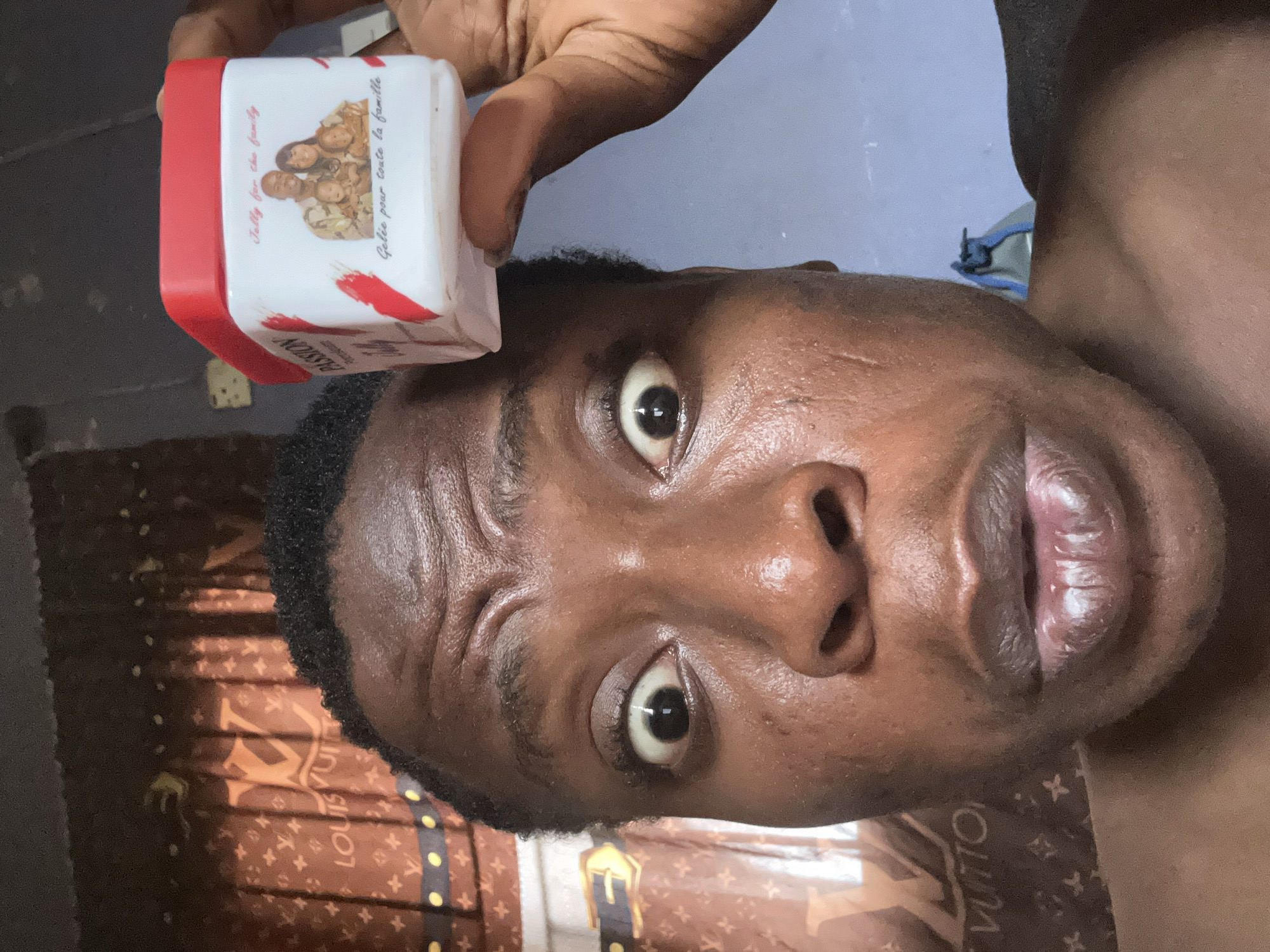 Person photographed with personal care products, various expressions captured