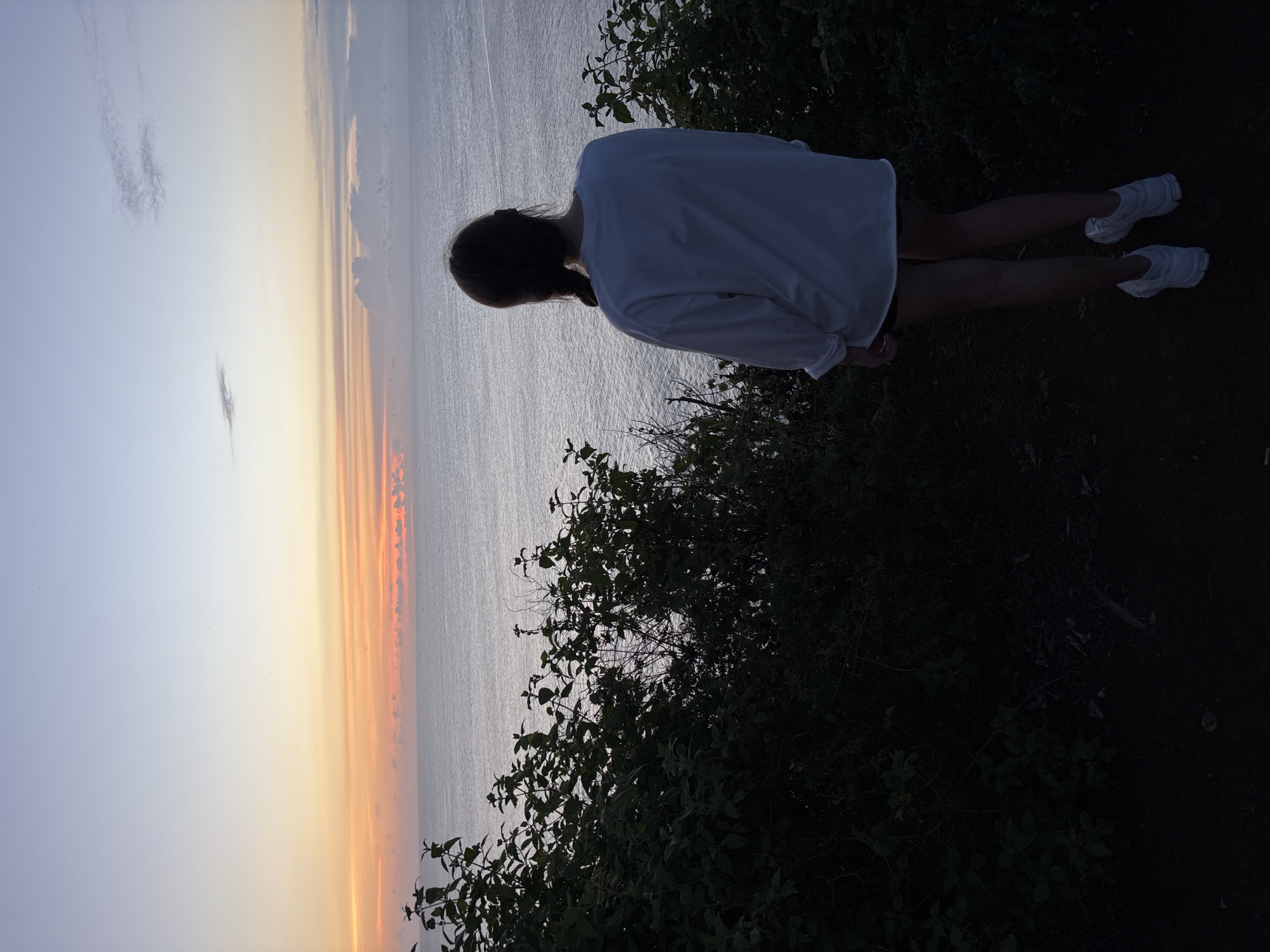 Tourists gather at Pecatu cliffs for ocean views and photos