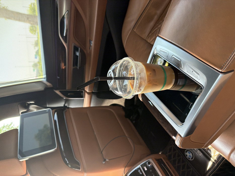 Iced coffee spotted in luxury BMW rear compartment, Dubai