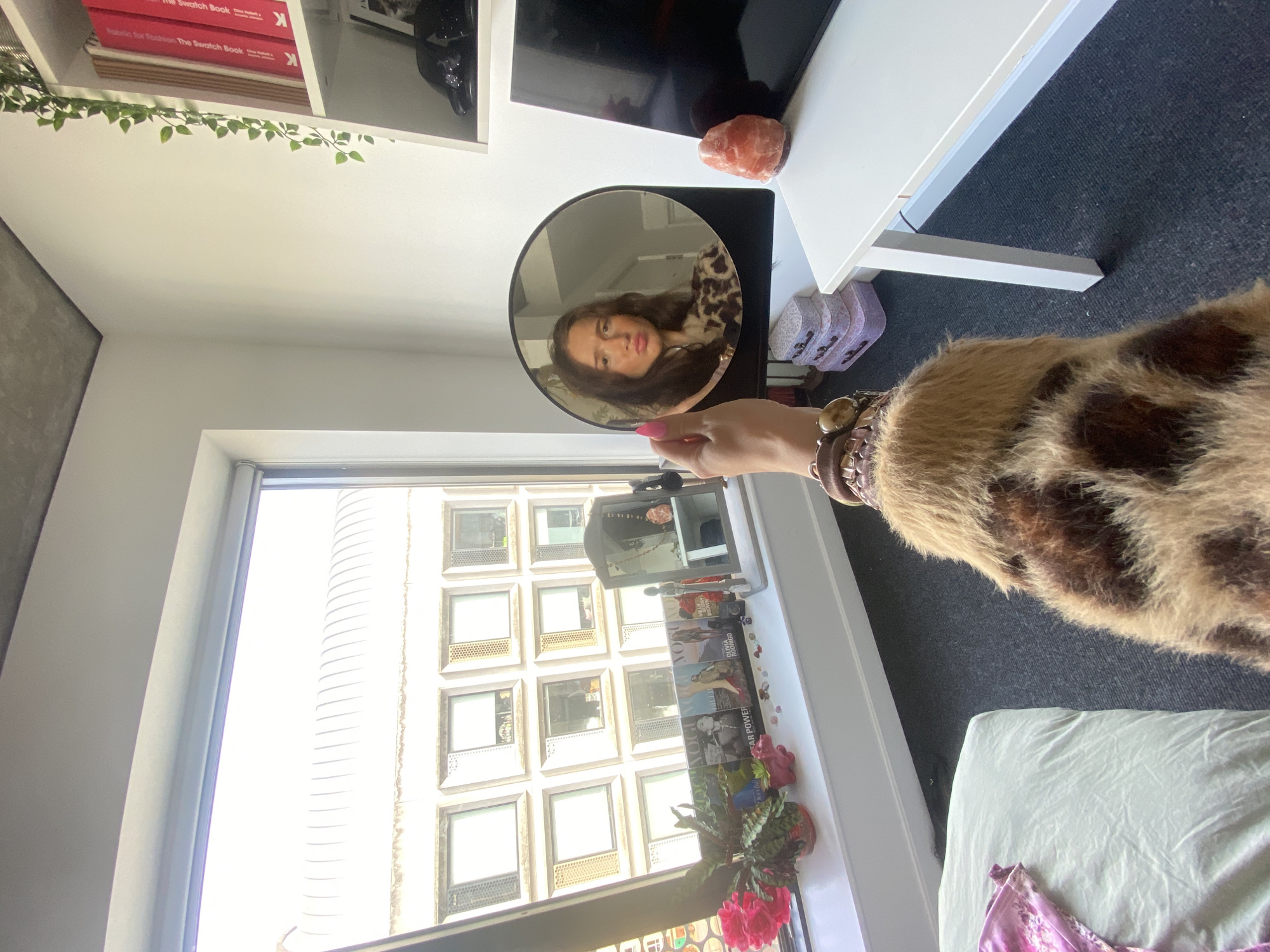 Mirror selfie series in a London building, leopard print fit
