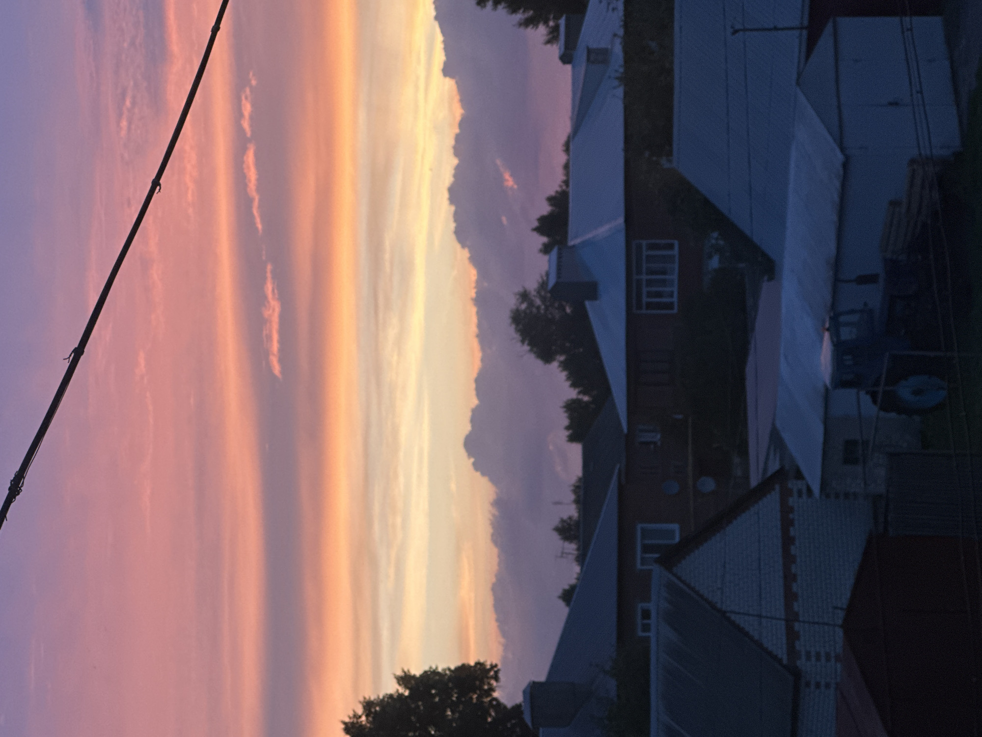 Vivid summer sunset over rural Rasskazovo, Russia