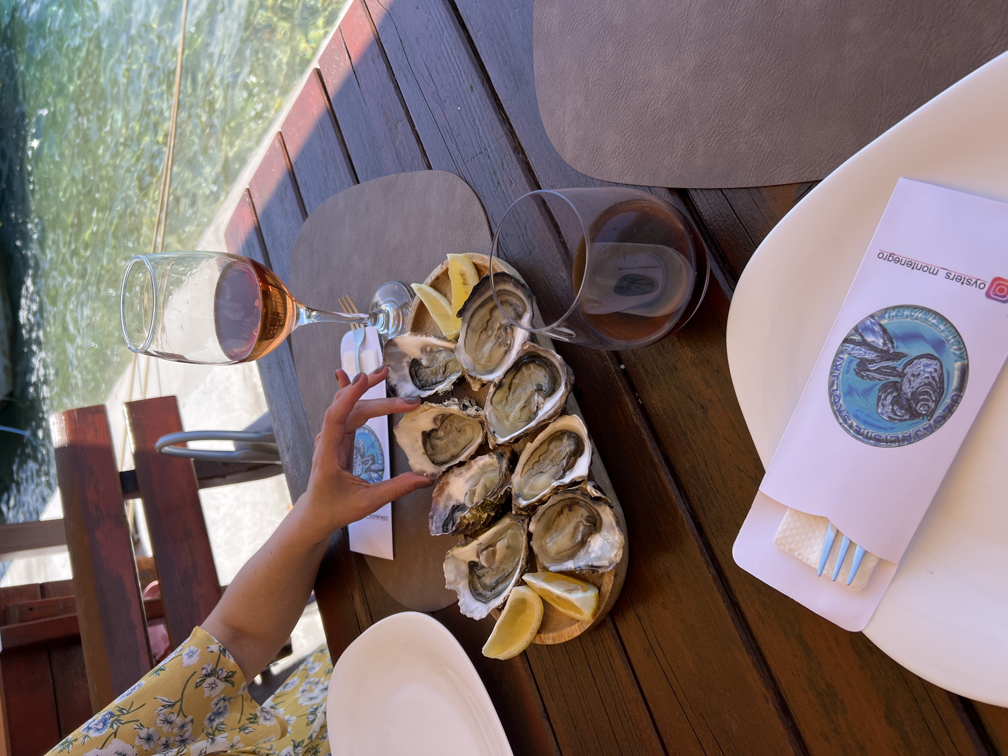 Waterside seafood dining documented in Jošice, Montenegro