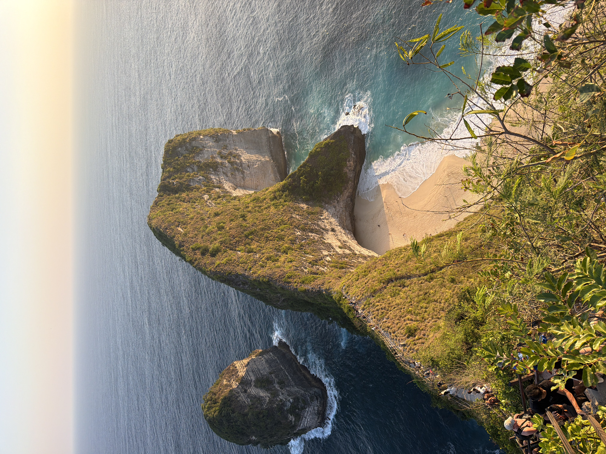 Aerial views and departing planes over Nusa Penida
