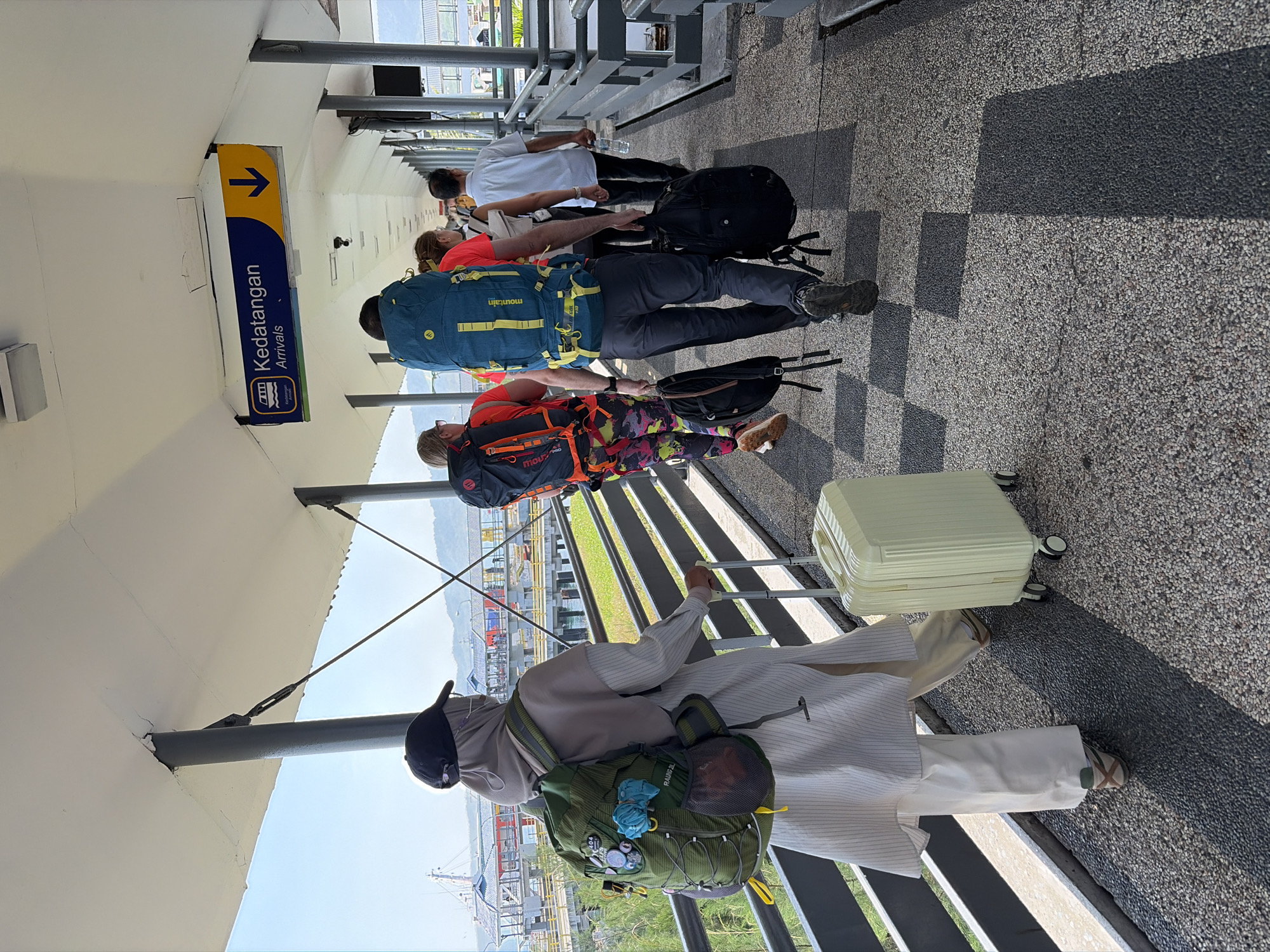 Busy ferry departure at Melaya pier, Indonesia