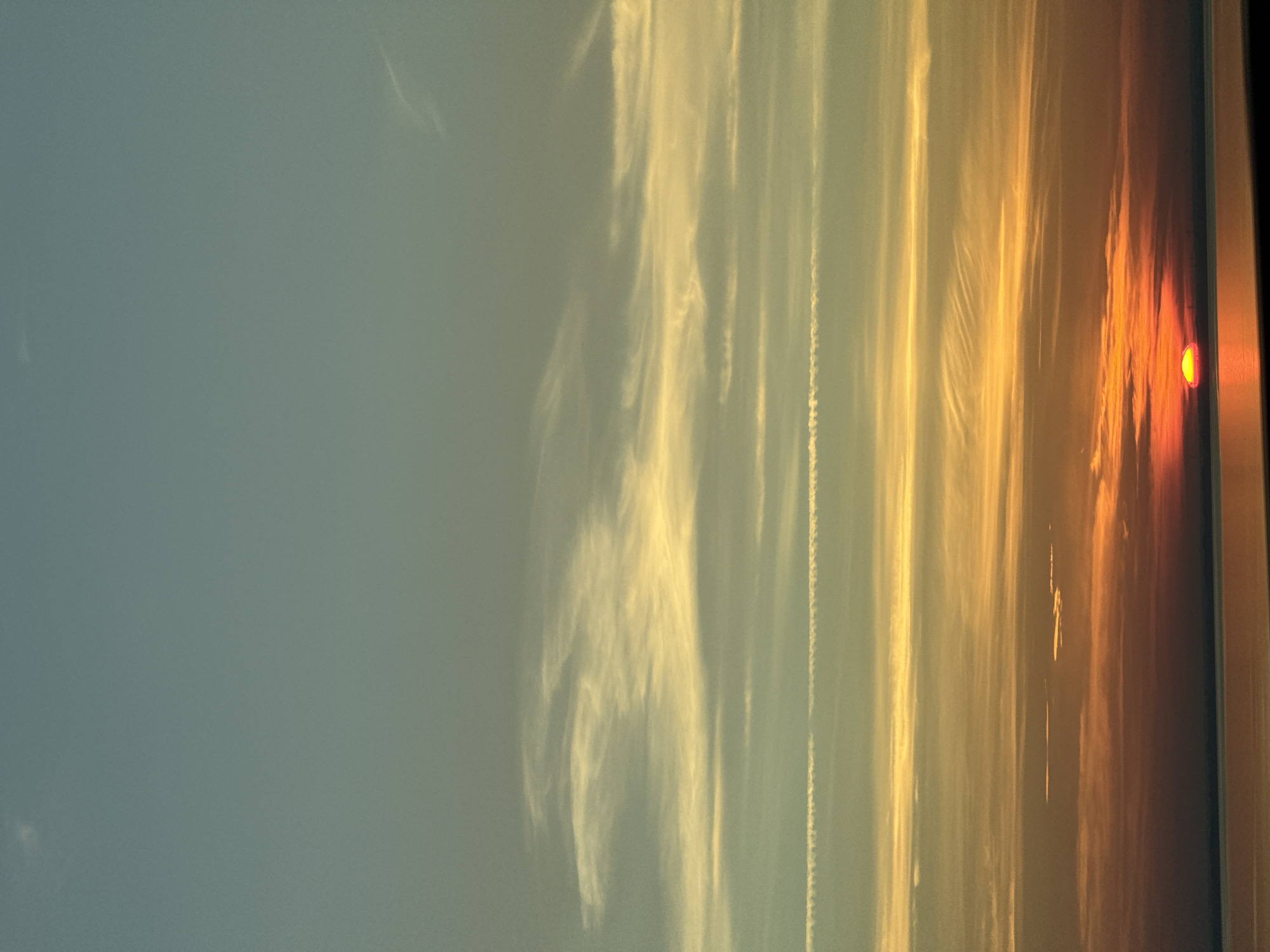 Vivid summer sunset over Danish coastal waters