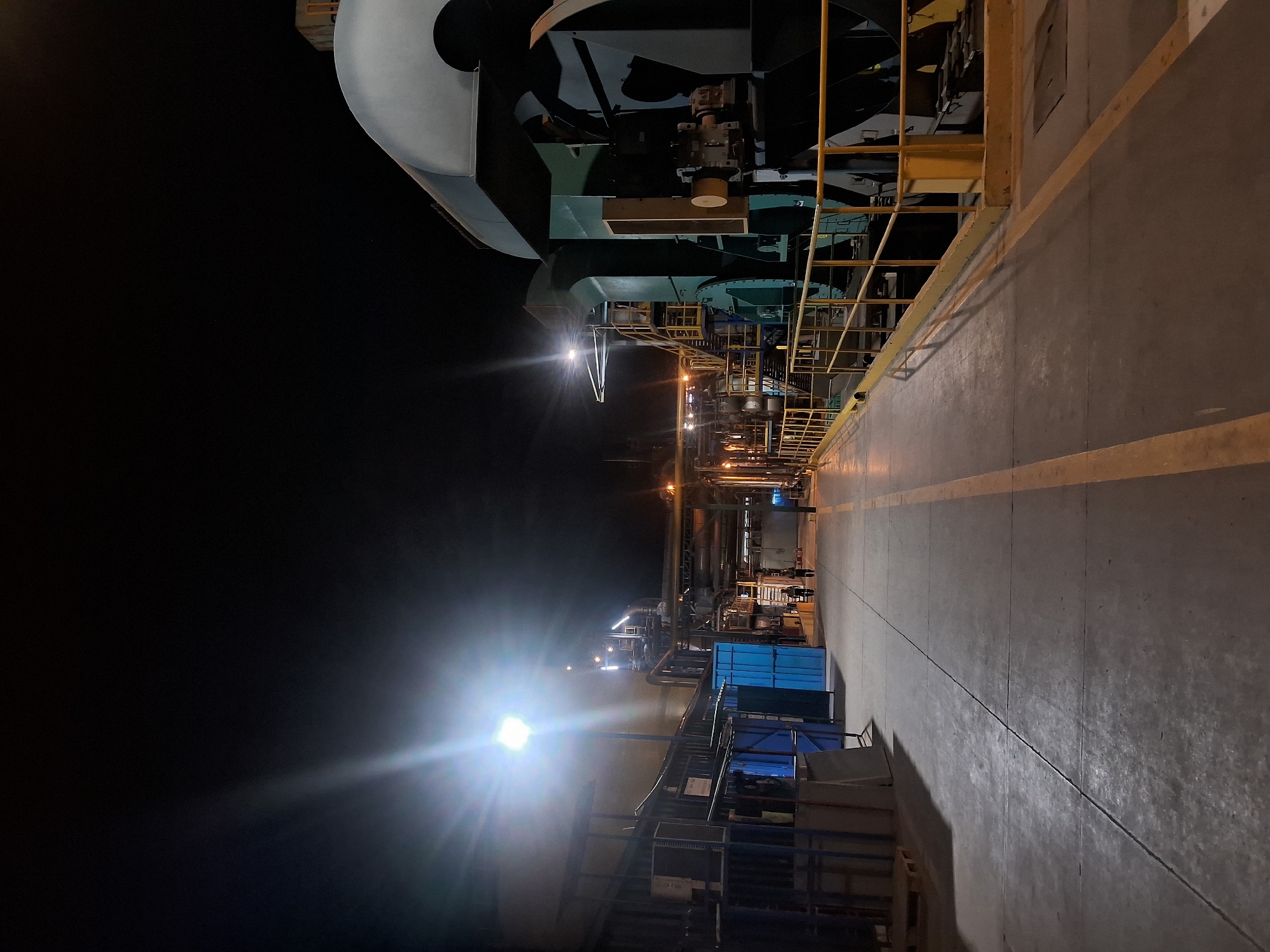 Industrial facility photographed operating at night in Chimbote, Peru