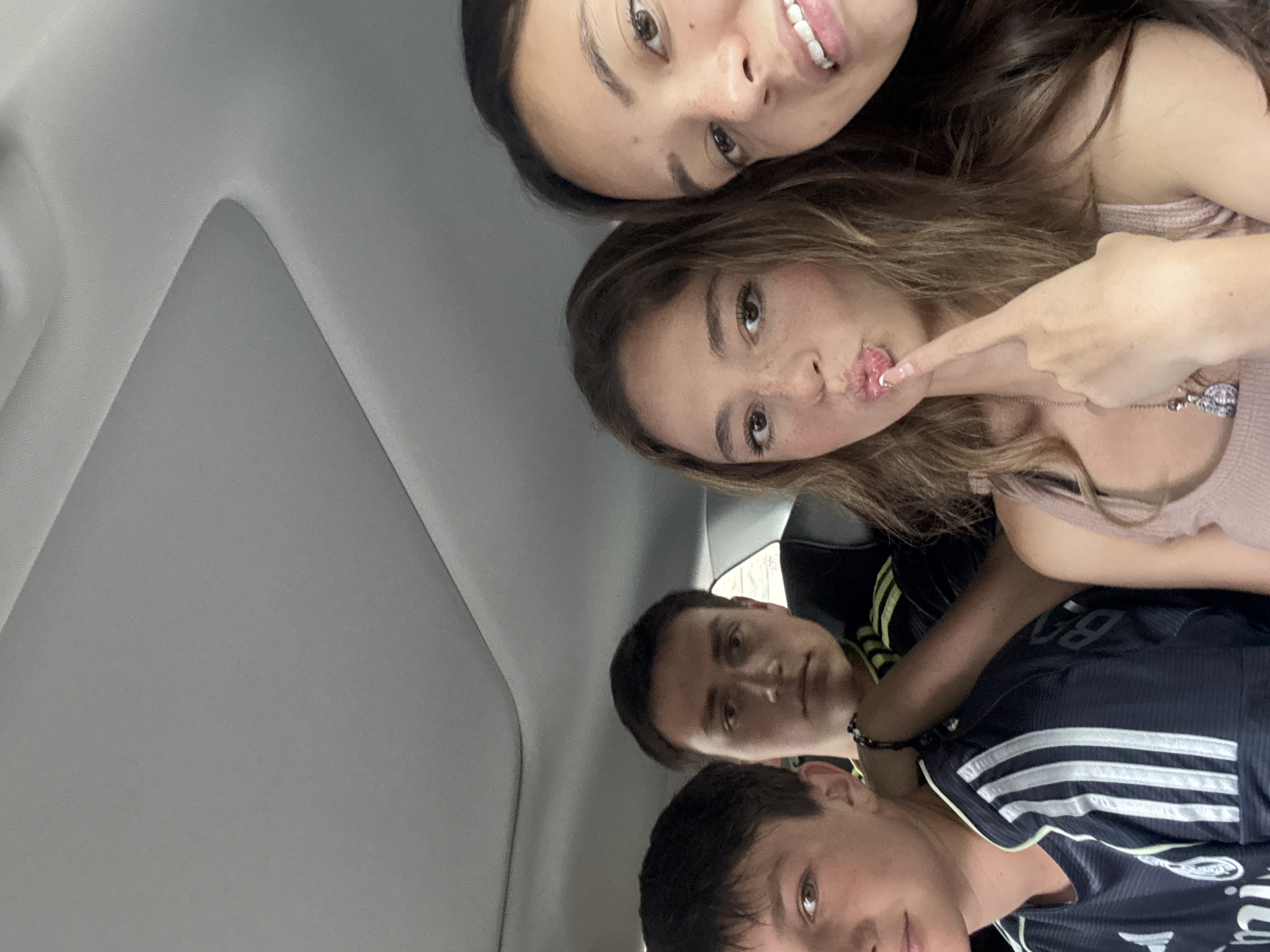 Group photographed inside vehicle in San Bernardino Tlaxcalancingo