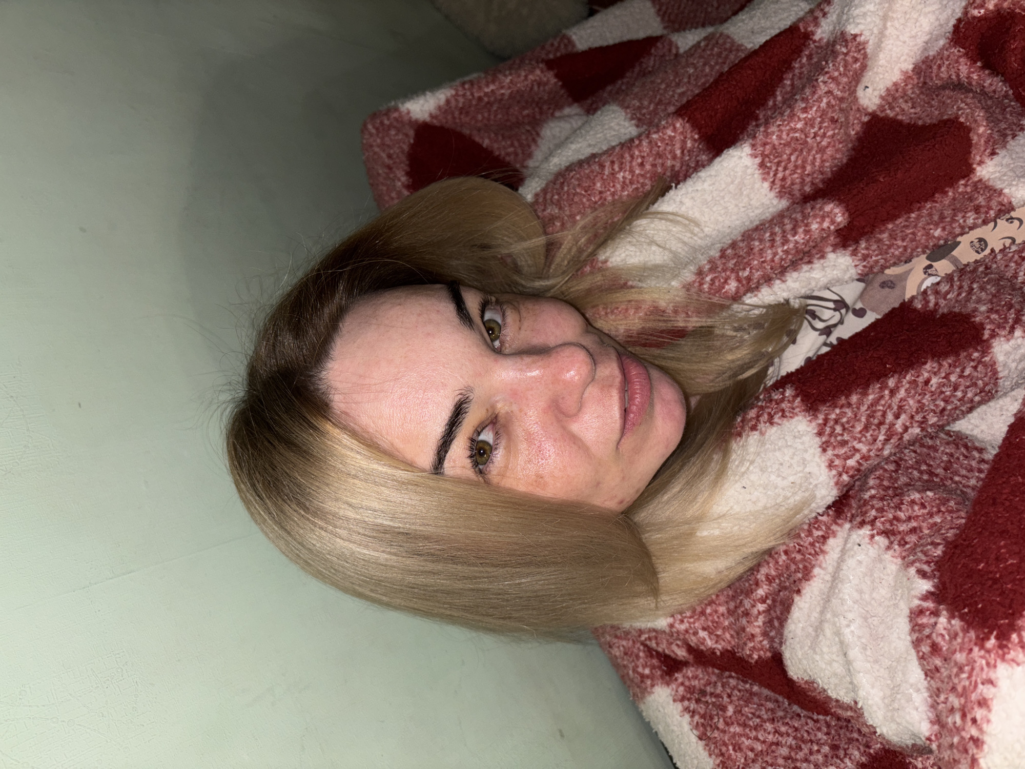 Woman photographed in casual indoor setting in Russia
