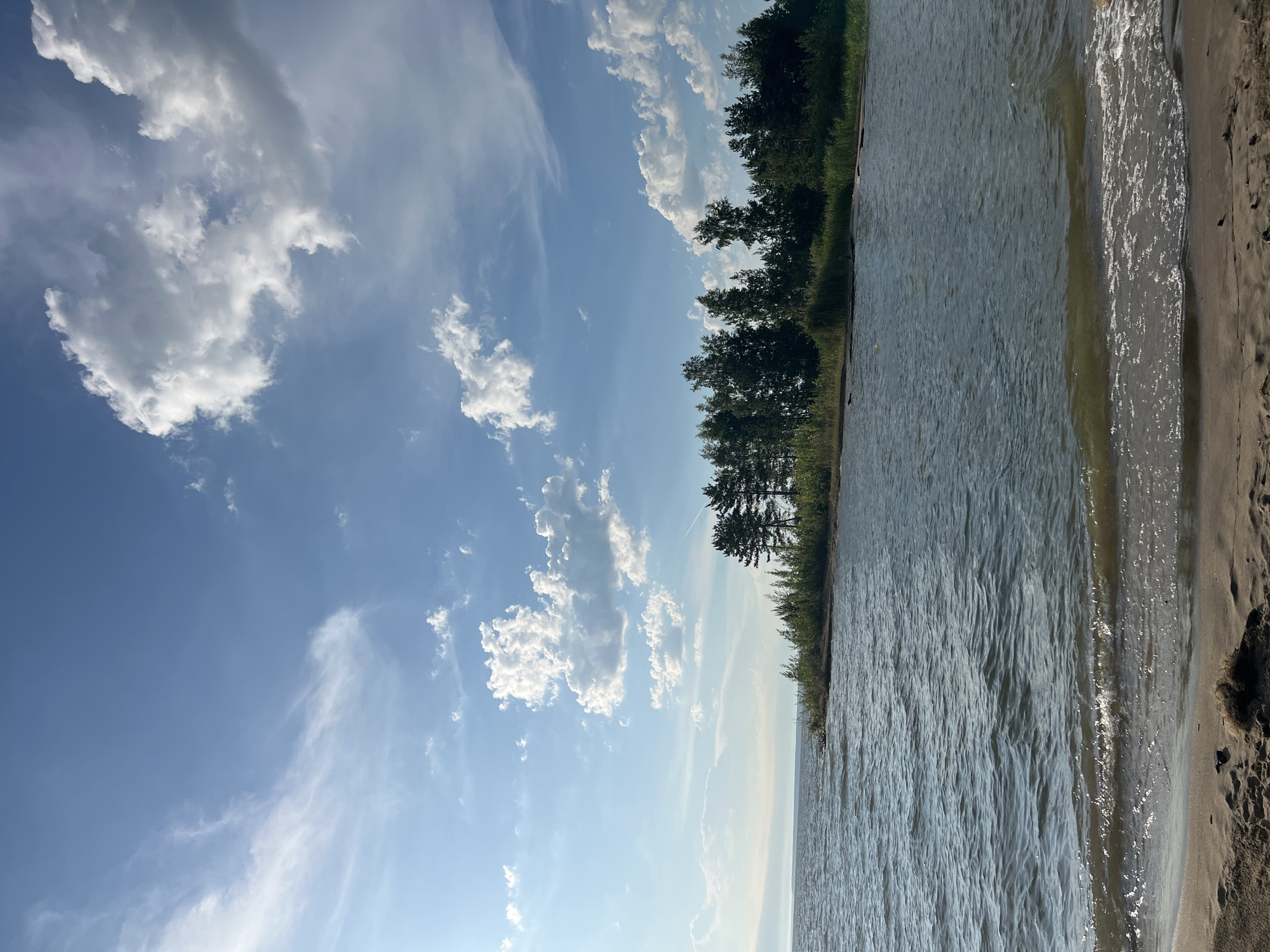 Sunny afternoon at a Borovoe lakeside beach