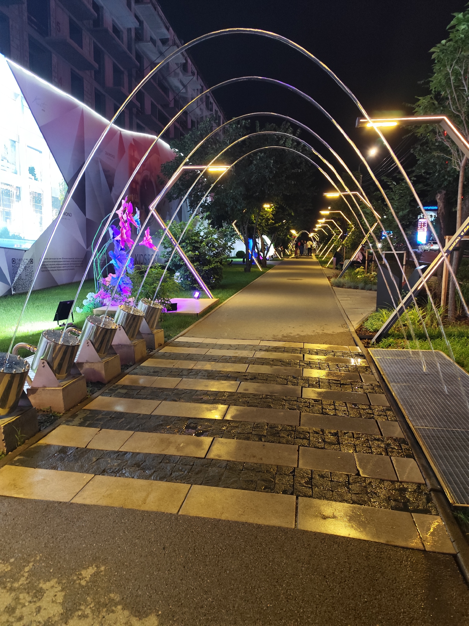 Almaty's lit-up entertainment district at night