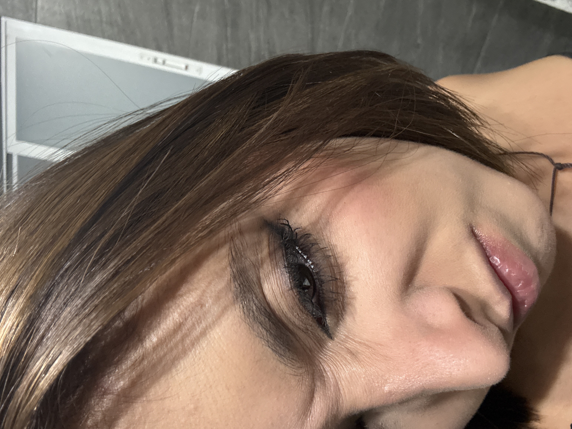 Woman's makeup documented in close-up view in Puebla