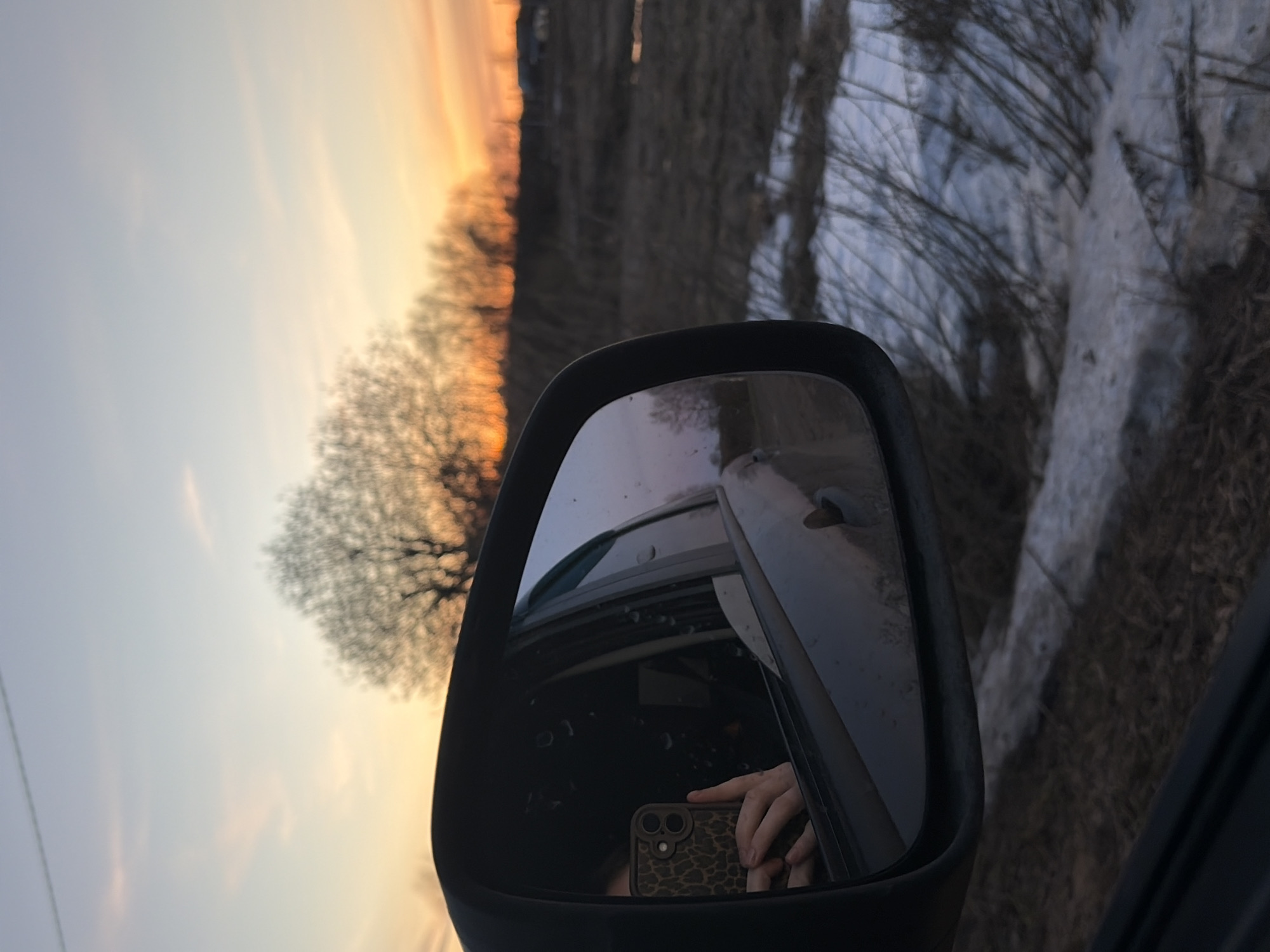 Twilight landscapes and smartphone reflection captured in Foteni, Russia