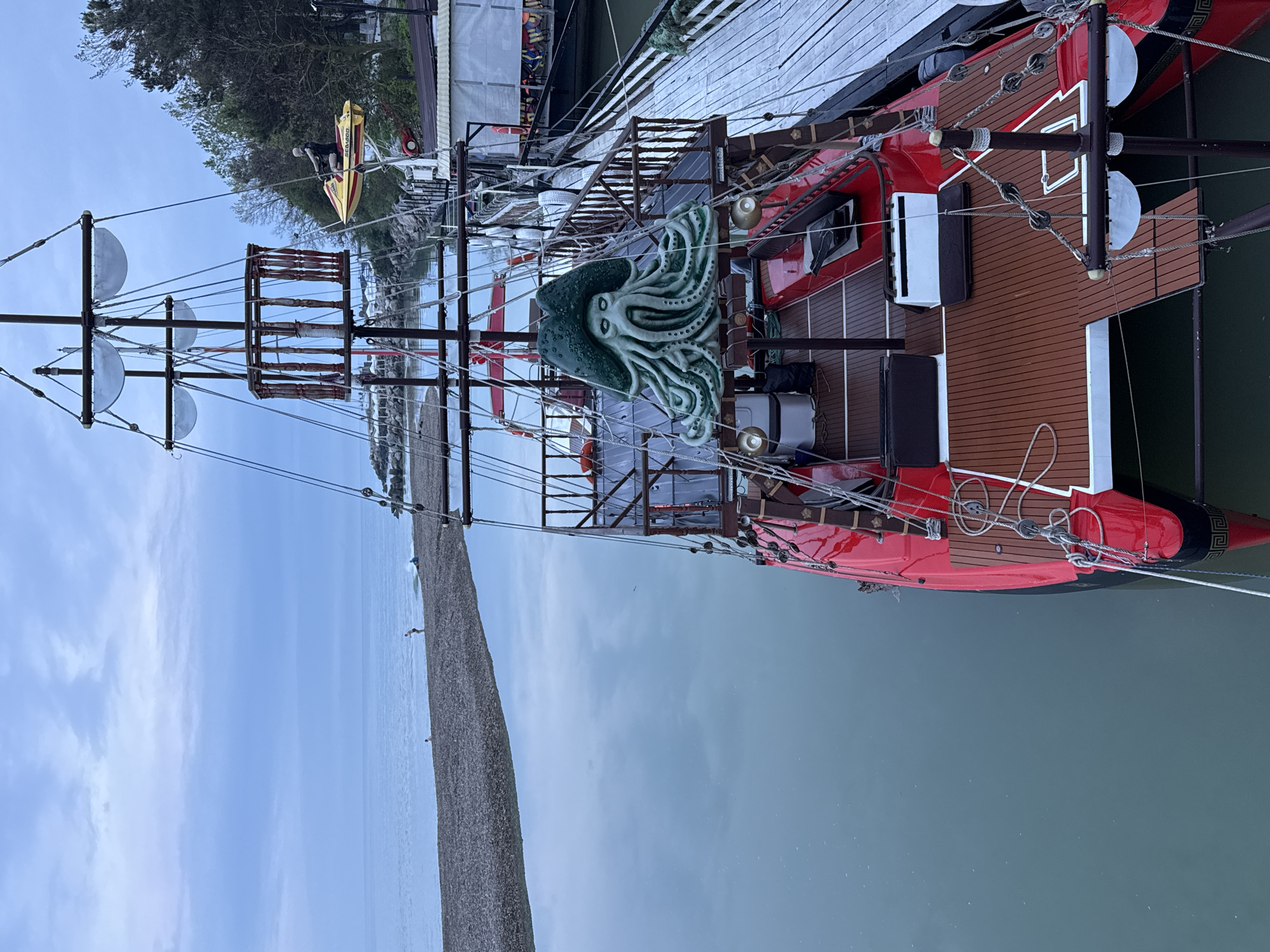 Coastal life captured in Novomikhaylovsky: fishing, cats, pirate ship