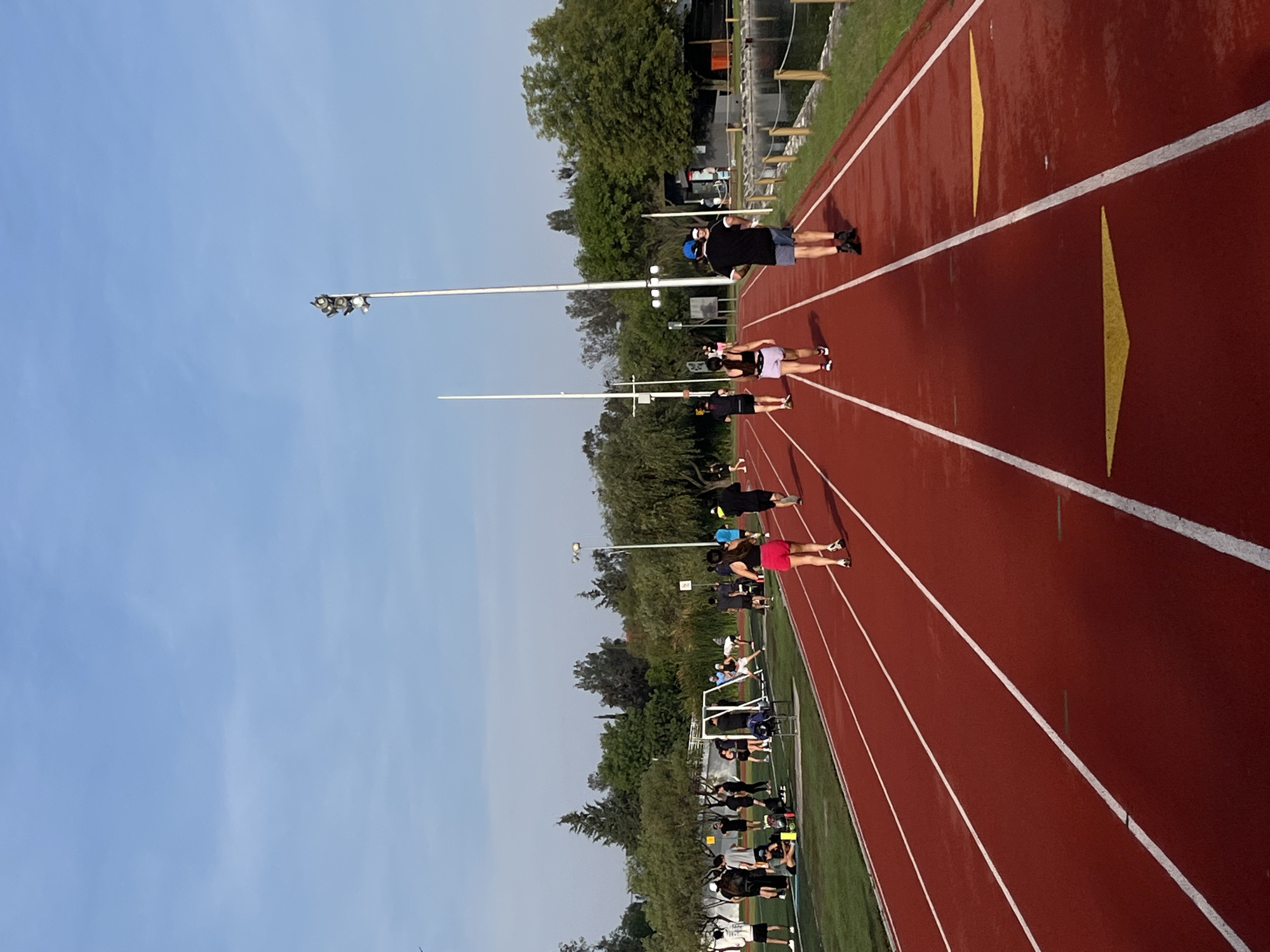 Group gathers on running track in Puebla, Mexico