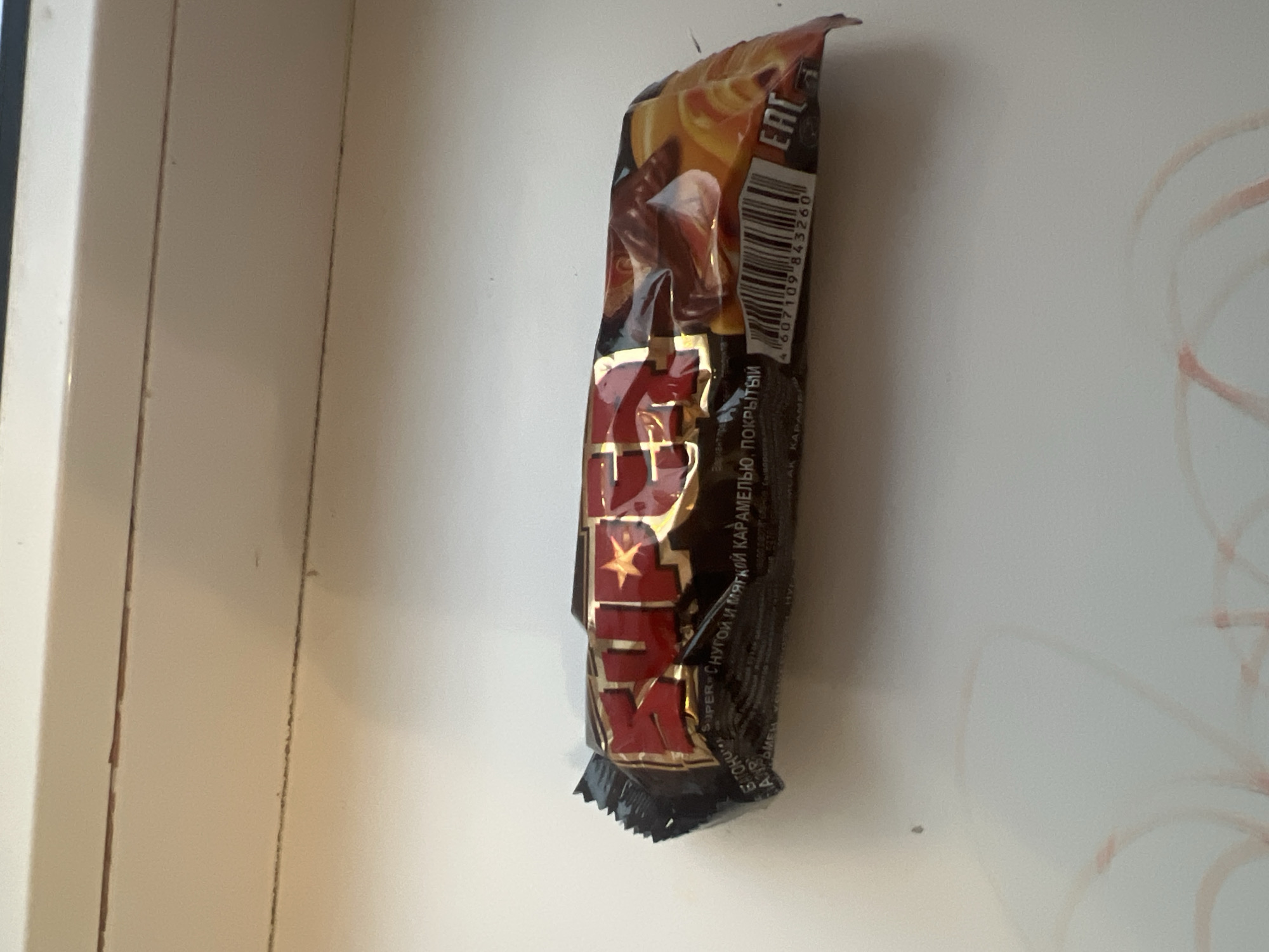 Random indoor snapshots: Russian candy wrappers, toy bugs, and odds and ends