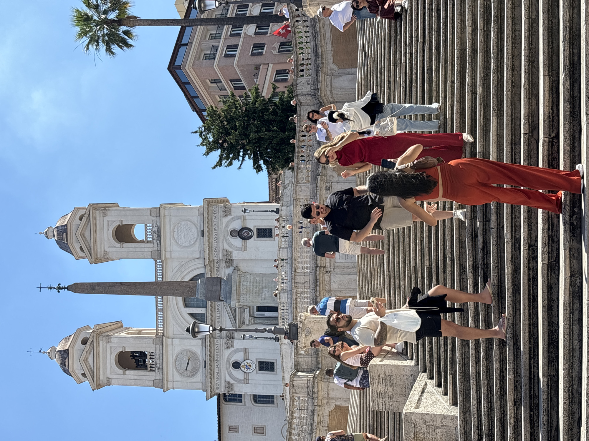 Busy morning at Rome's Spanish Steps on a sunny day
