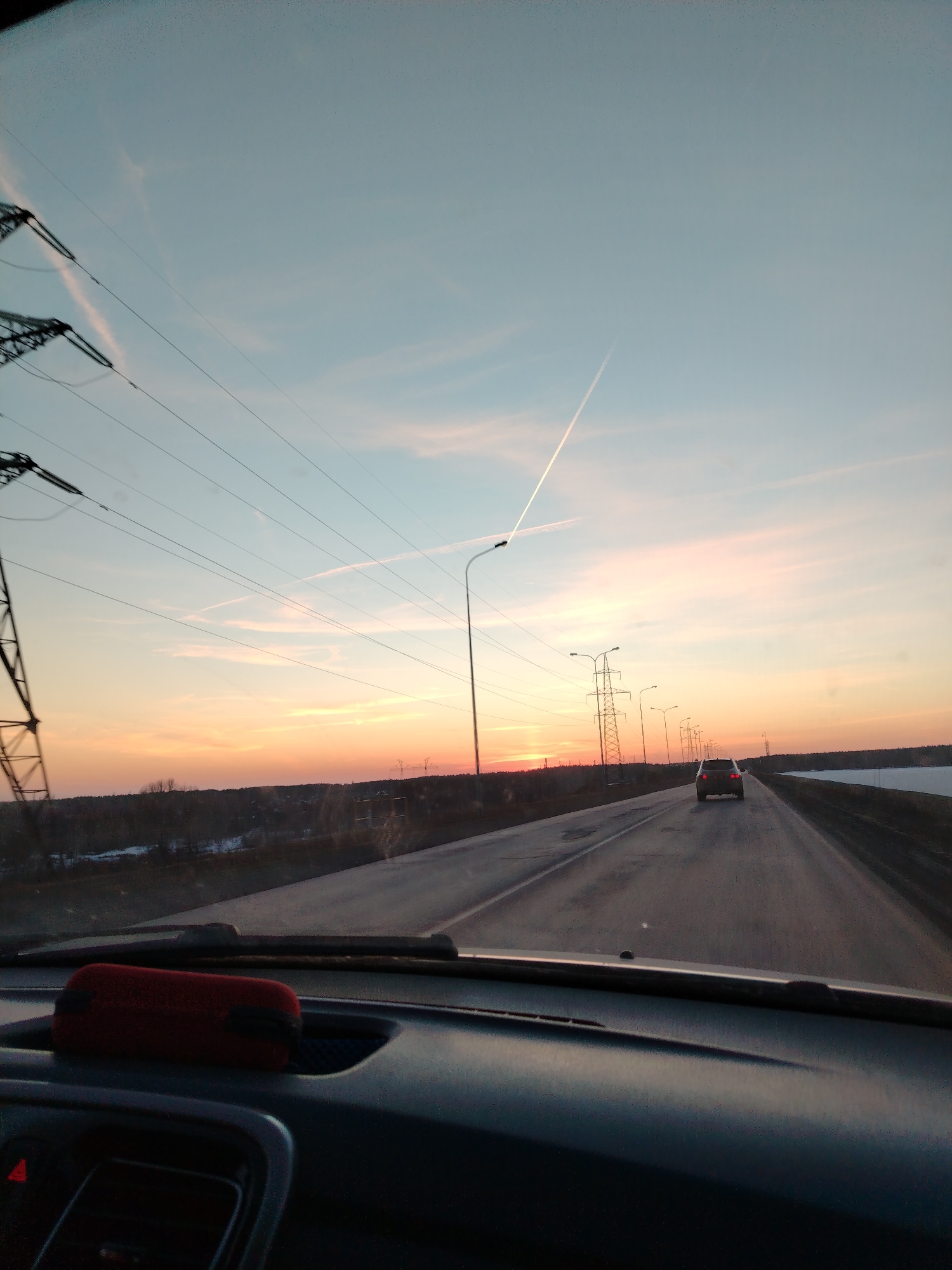 Sunset captured by drivers near Chaikovsky, Russia reservoir