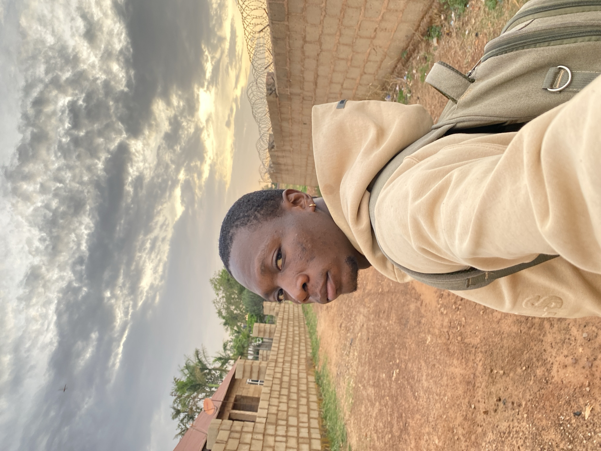 Man takes selfies outdoors in Bukuru, Nigeria