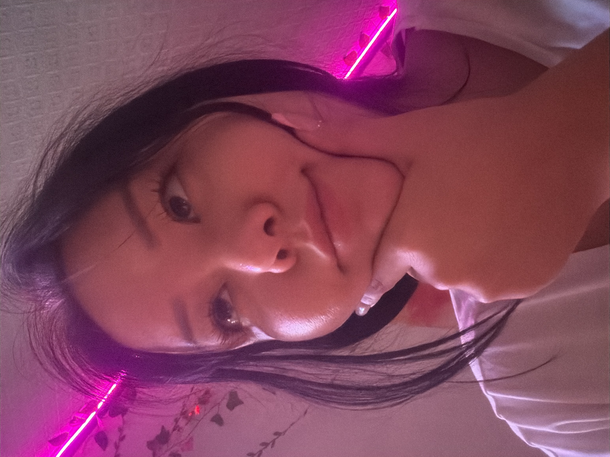 Cozy, pink-lit room aesthetic in Almaty