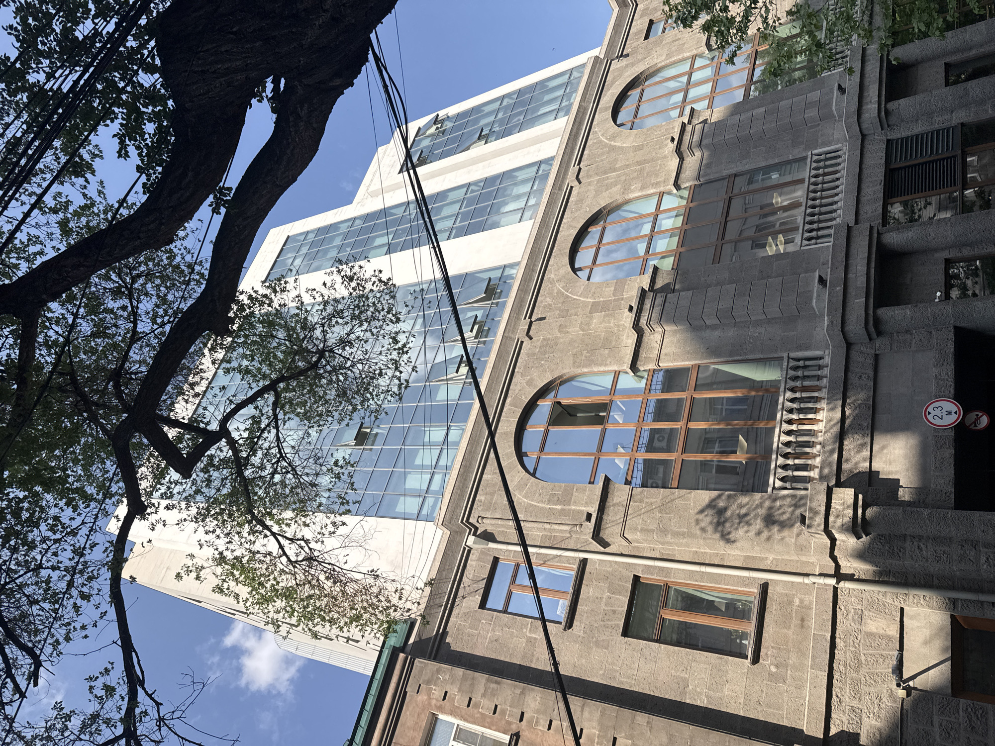 Traditional and modern architecture contrasted in Yerevan morning scene