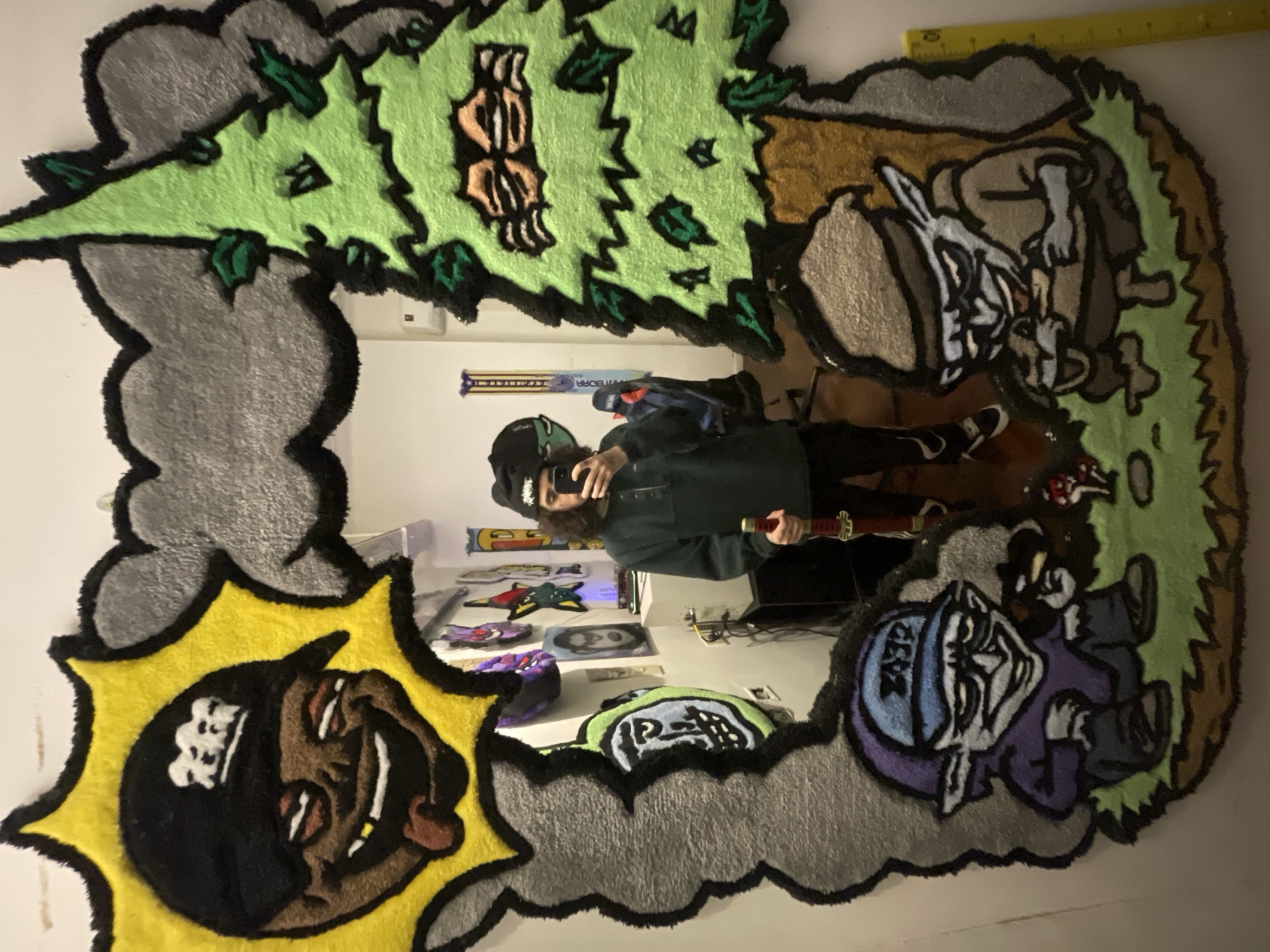 Young man takes mirror selfie in Buenos Aires studio
