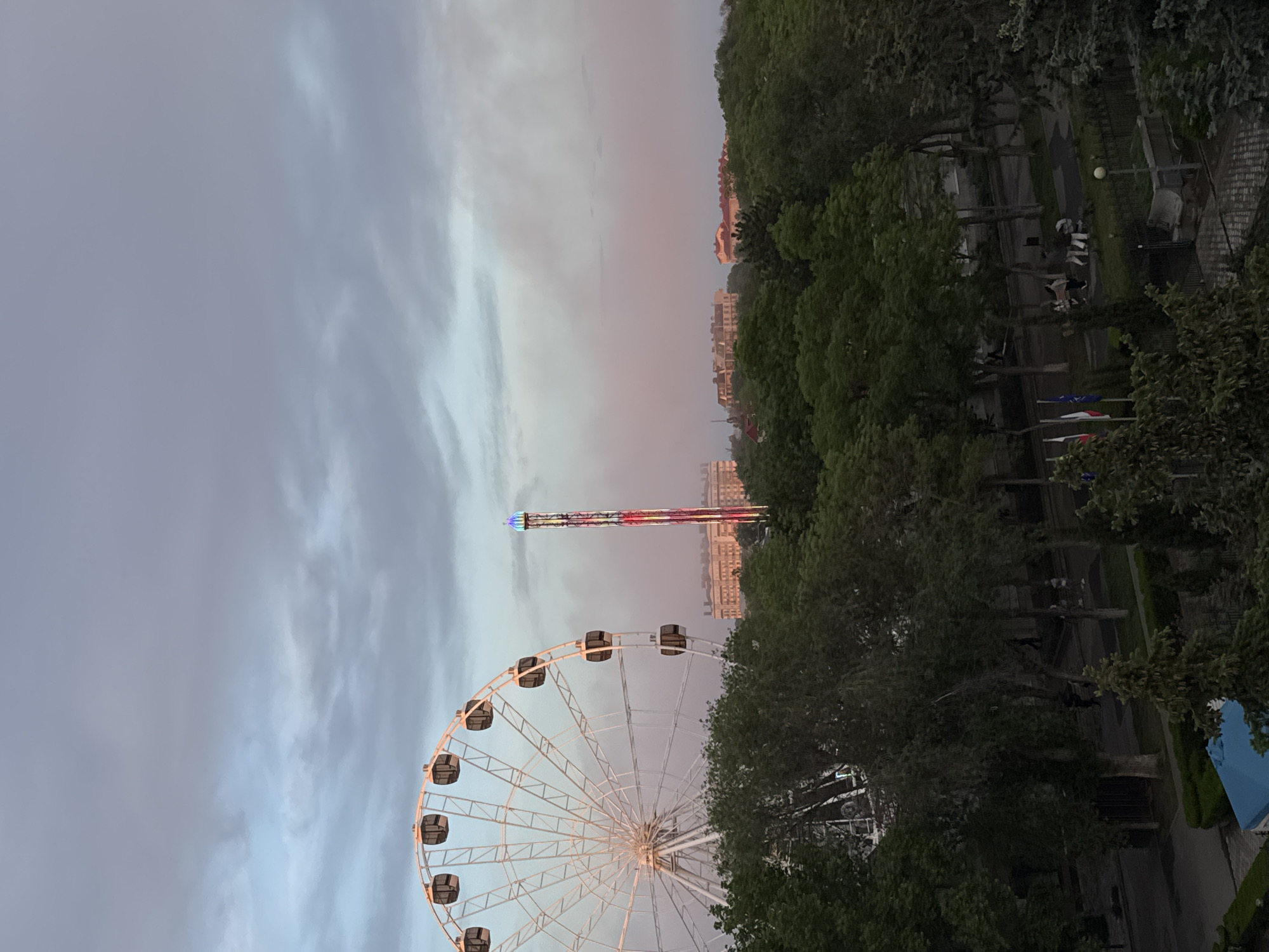 Evening view captured of Yevpatoriya's Ferris wheel and tower