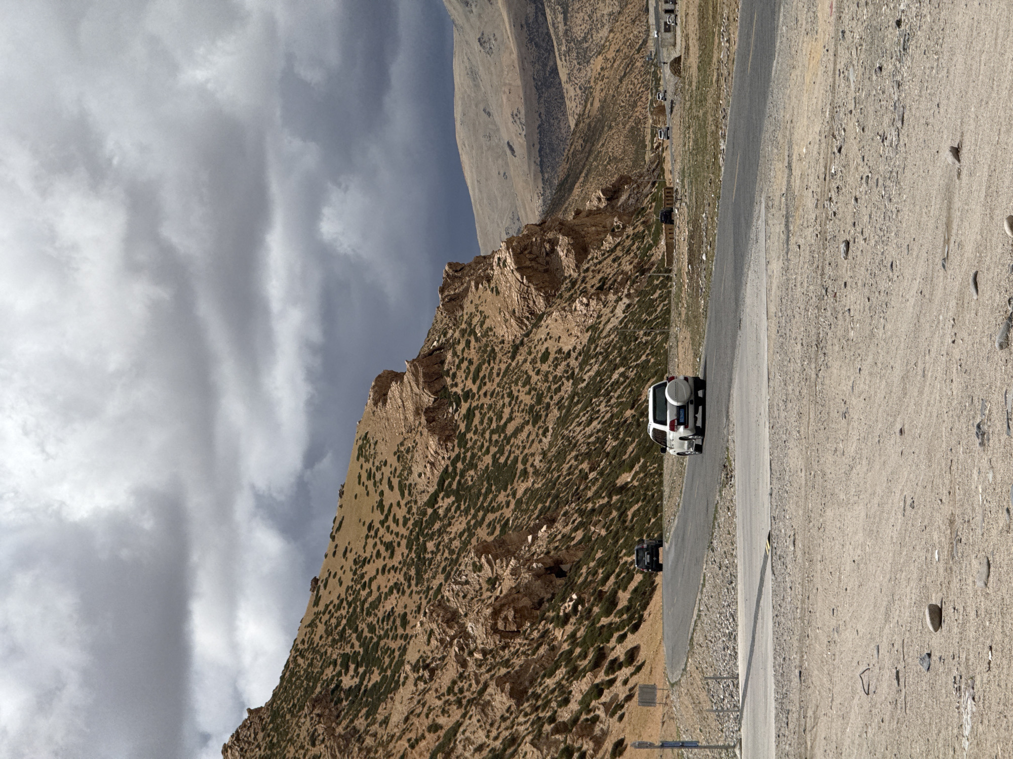 Gas station and mountain road documented in Kela Township