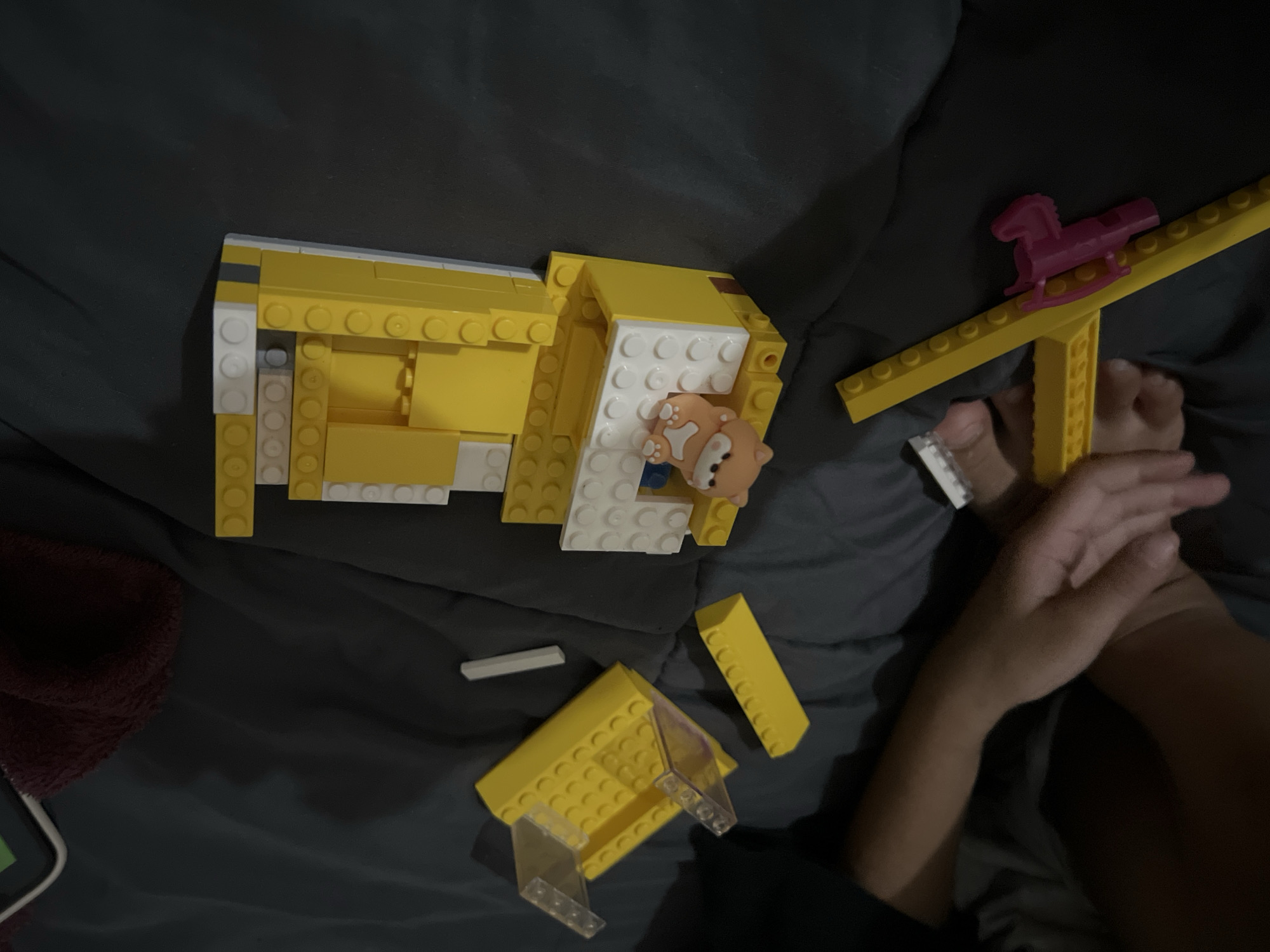 Children spend afternoon playing Lego and mobile games indoors