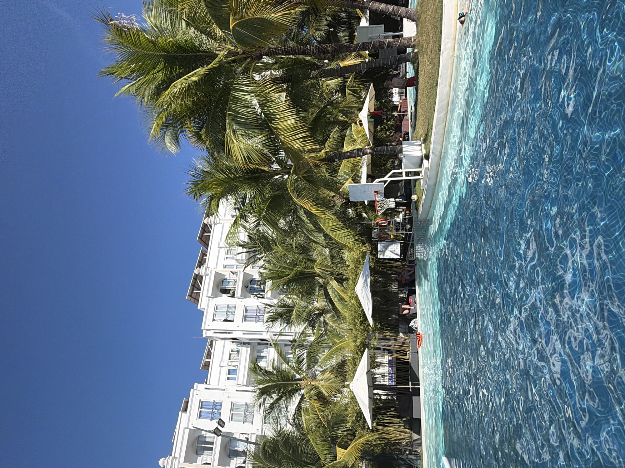 Sunny morning at a Nha Trang resort pool