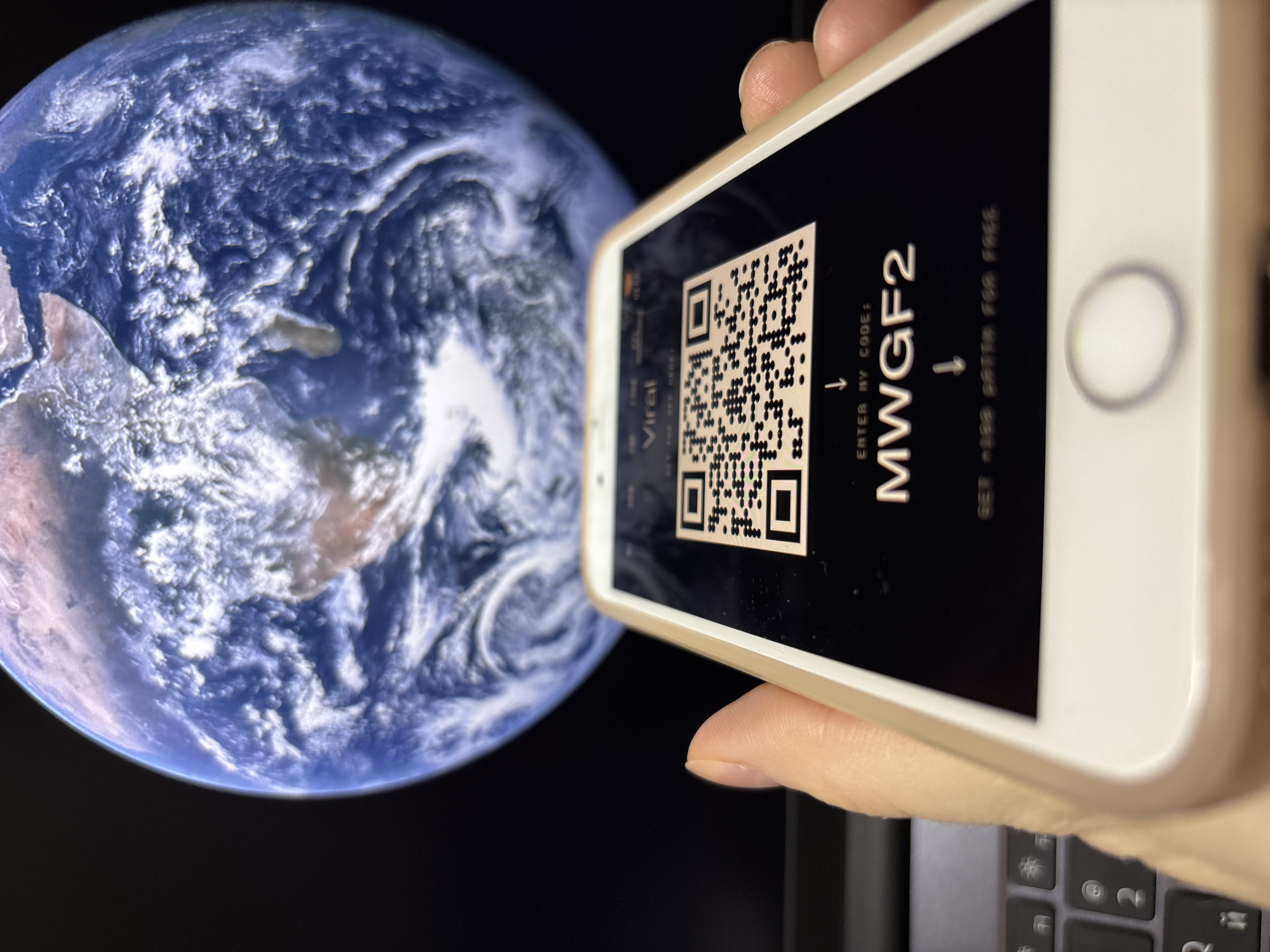 Person shares promotional QR code for digital rewards in Russia