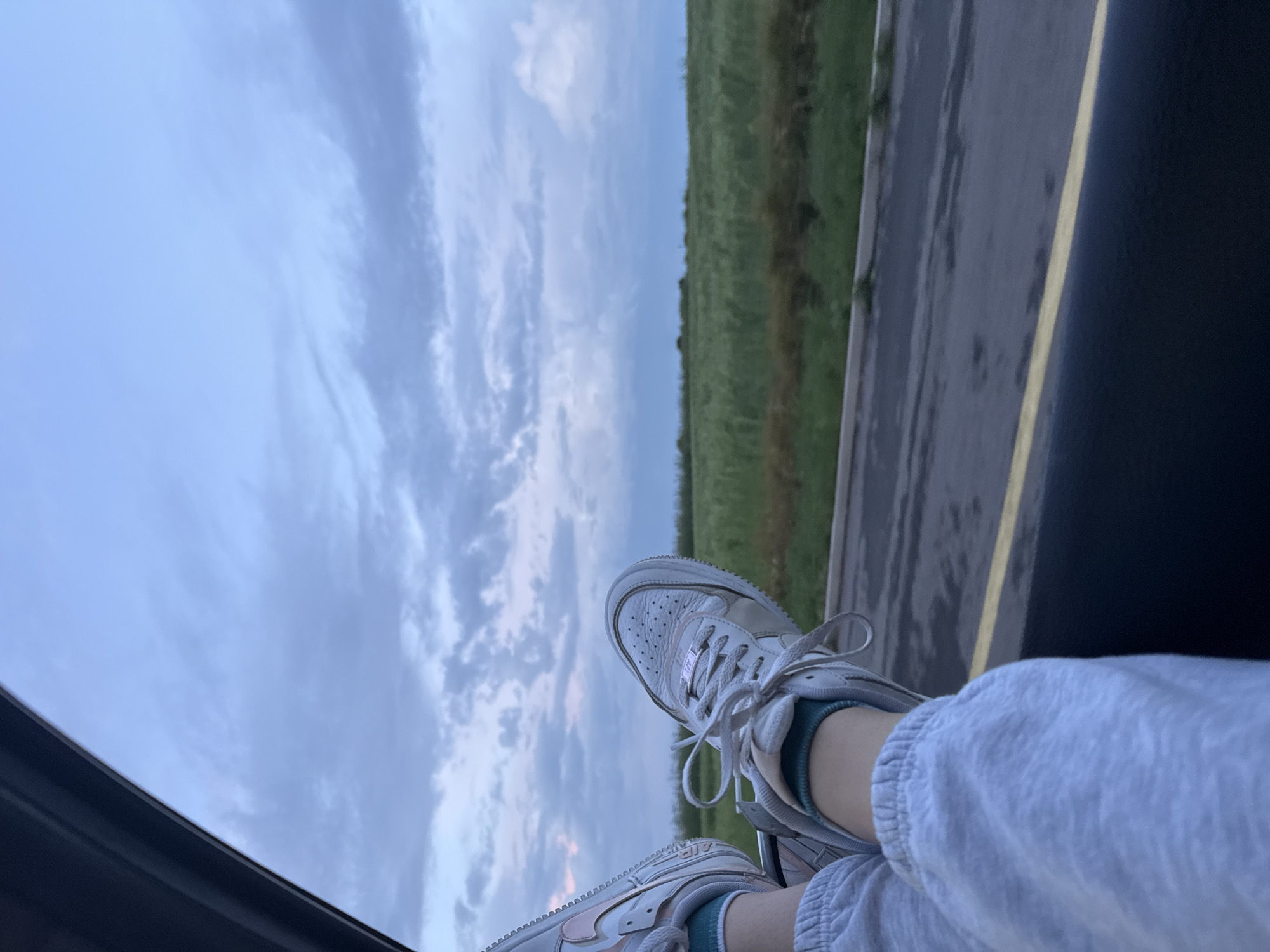 Feet Out Car Window During Evening Drive Through Burgas