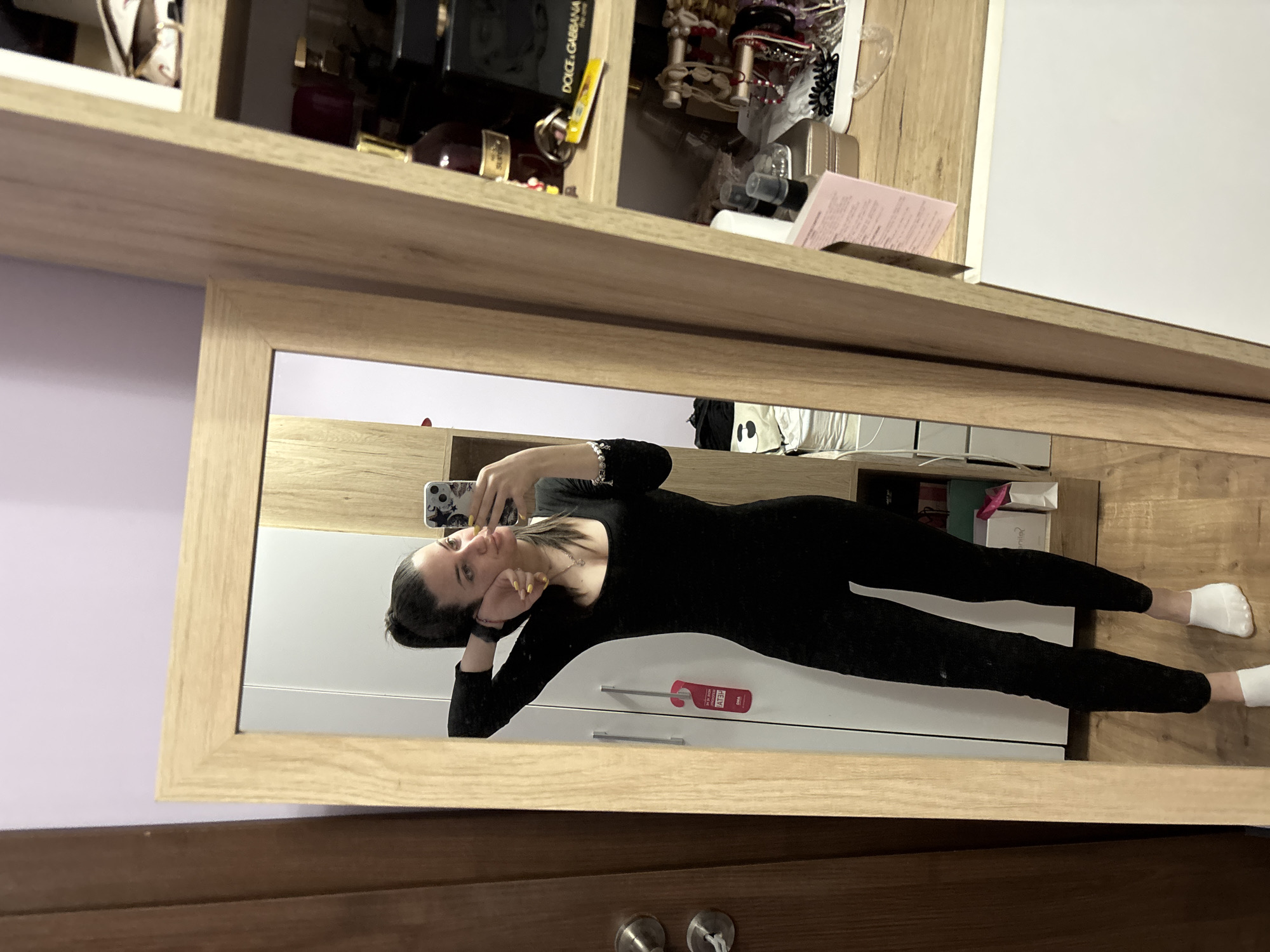 Woman takes mirror selfie in Chirpan, Bulgaria