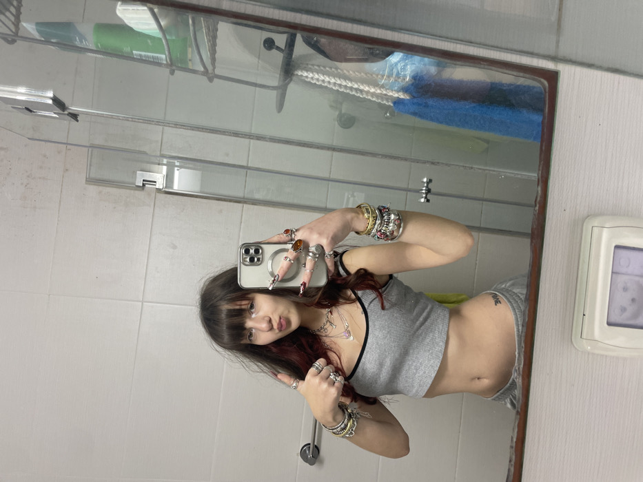 Woman documents evening takeout meal with selfies in Ra'anana
