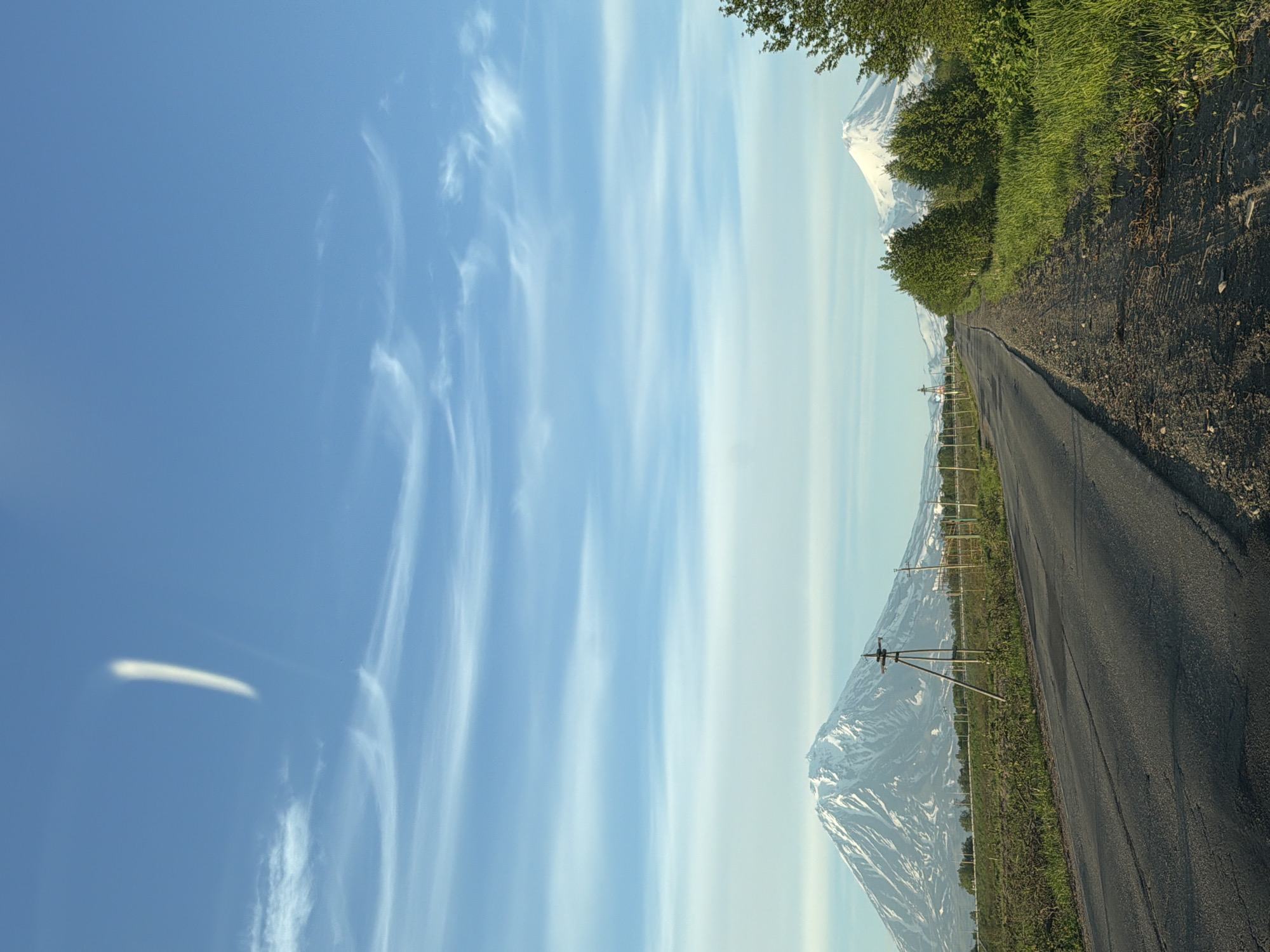 Road trip past a snow-capped Kamchatka volcano near Yelizovo