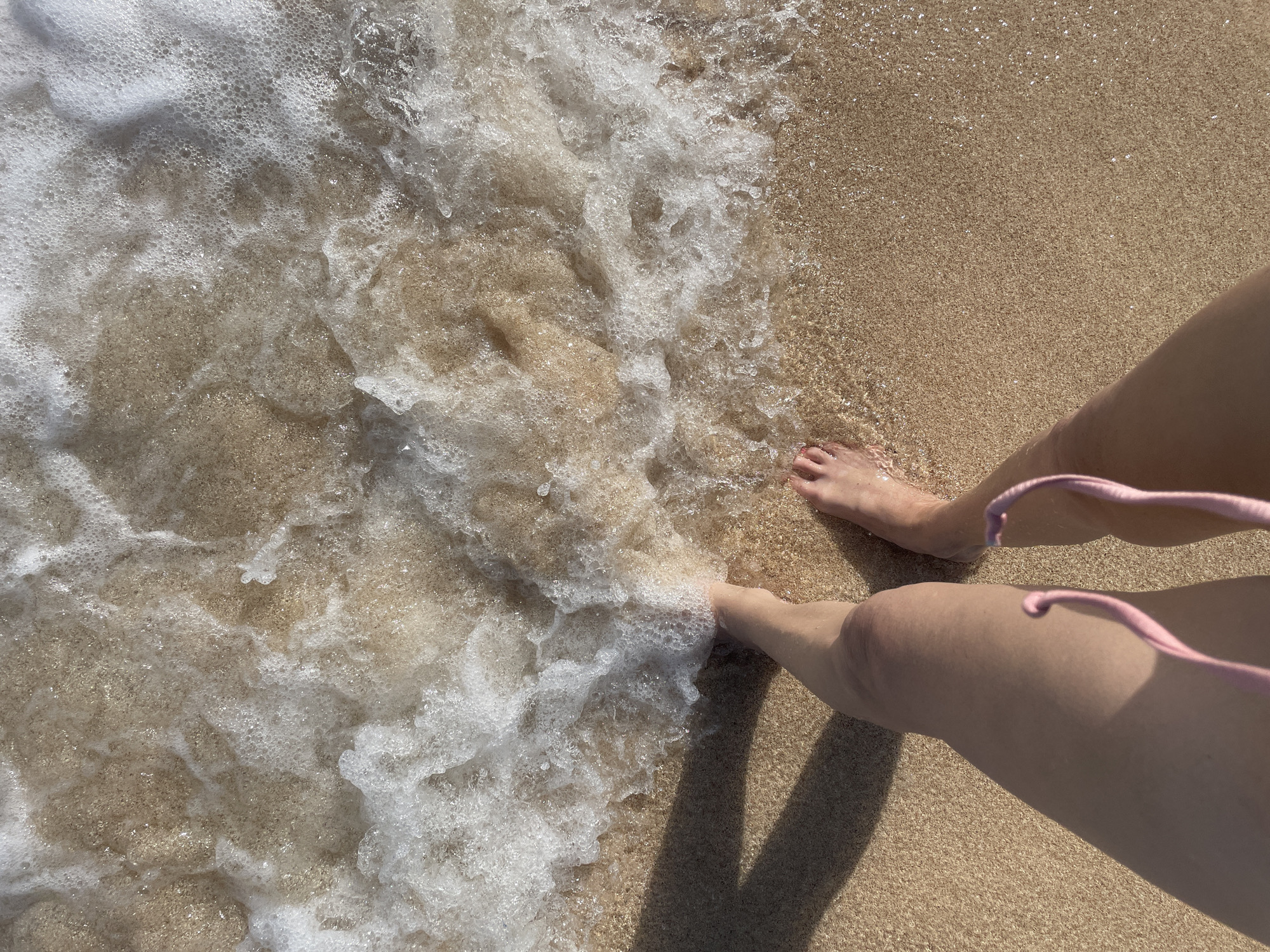 Morning in the Bali surf, wading and swimming at Kuta Selatan