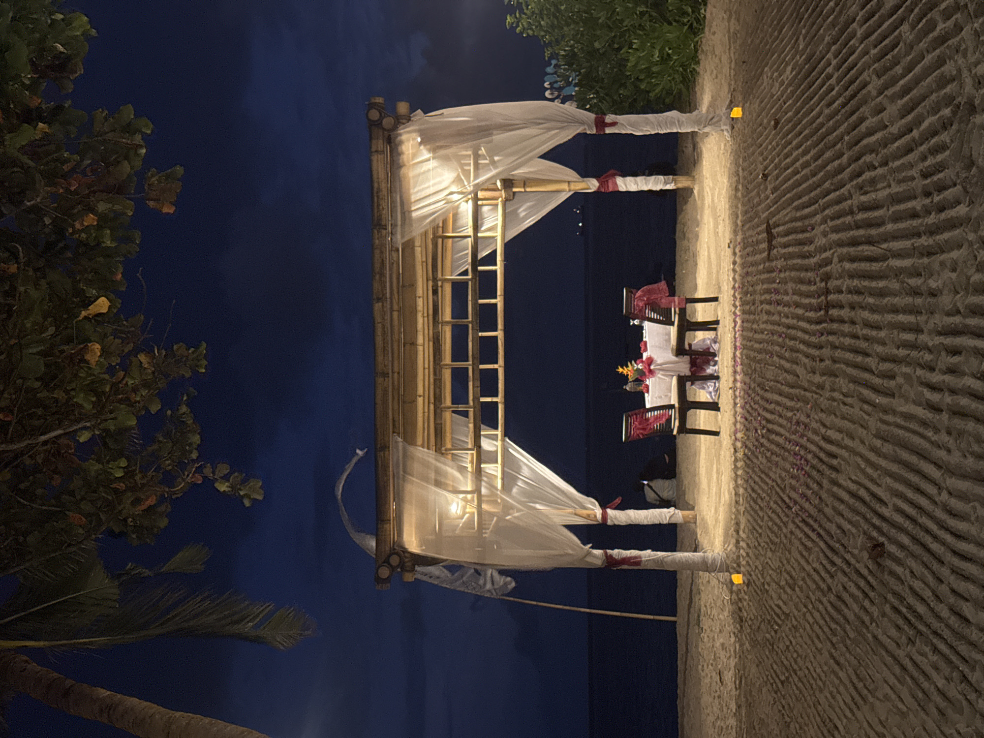 Evening beach gatherings and romantic dinner setup in Denpasar