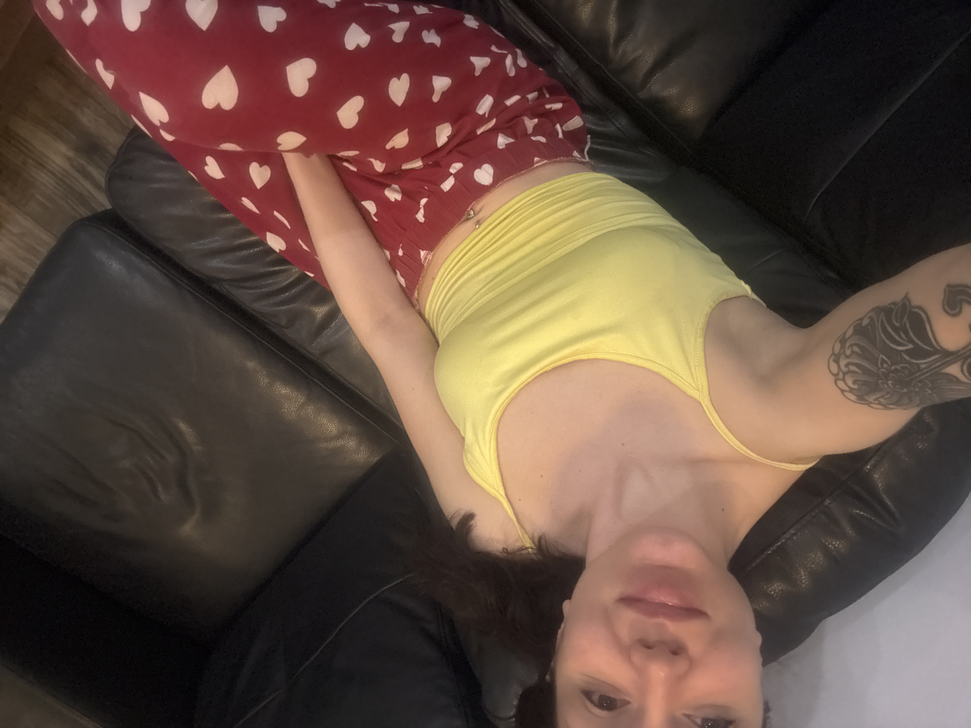 Woman rests on couch in Krasnovo, Bulgaria