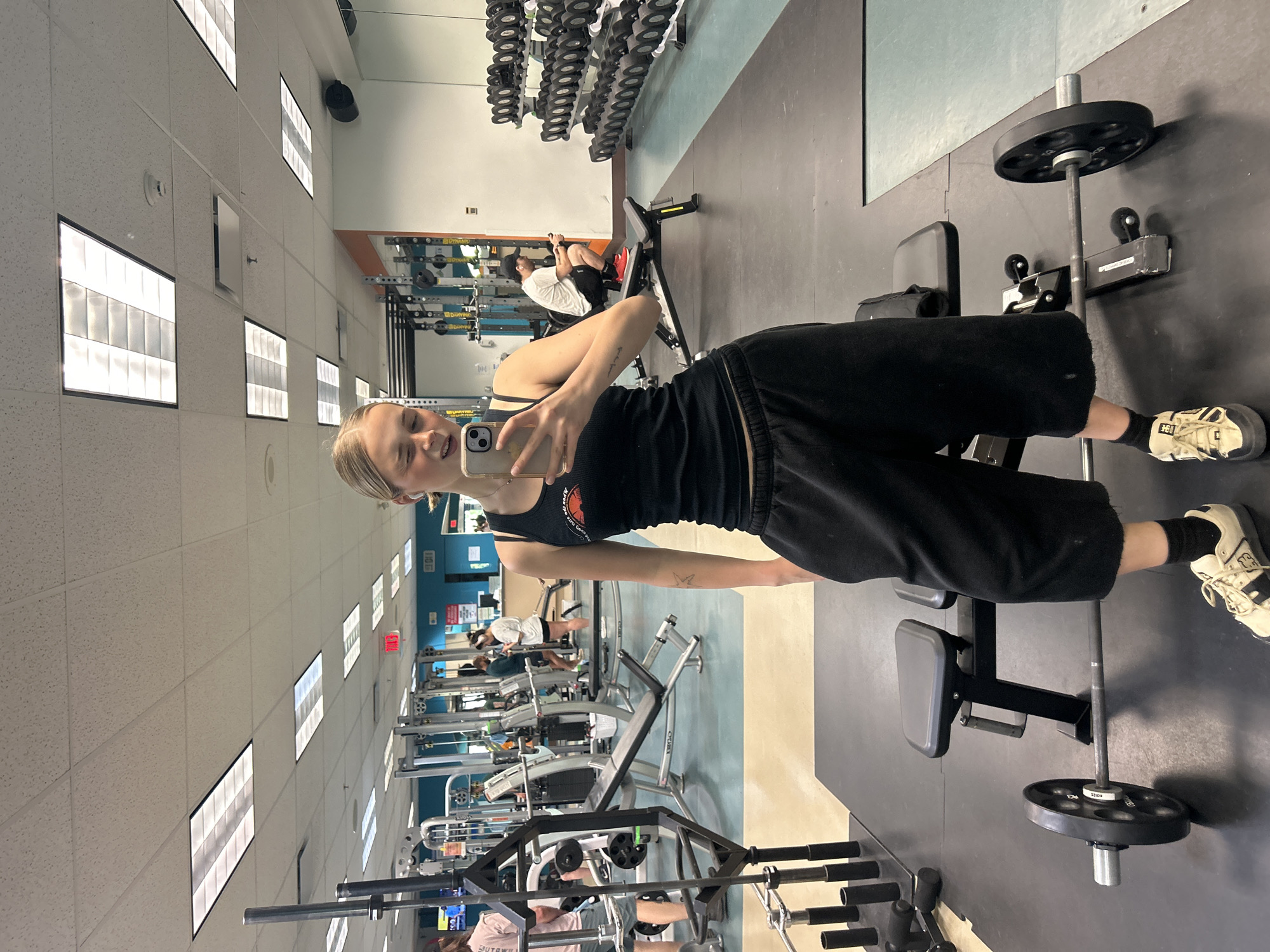 Woman takes gym selfie in Whistler fitness facility