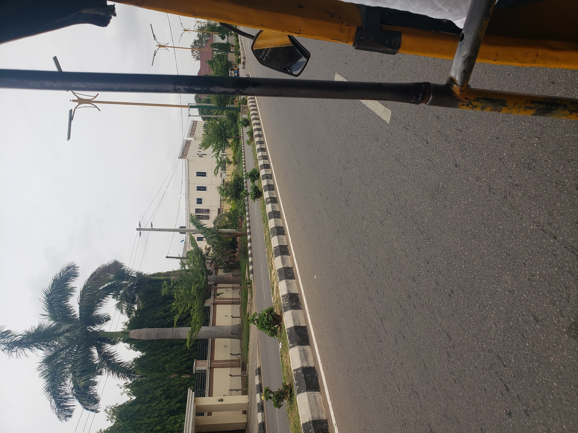 Passenger documents rickshaw journey through Kaduna streets