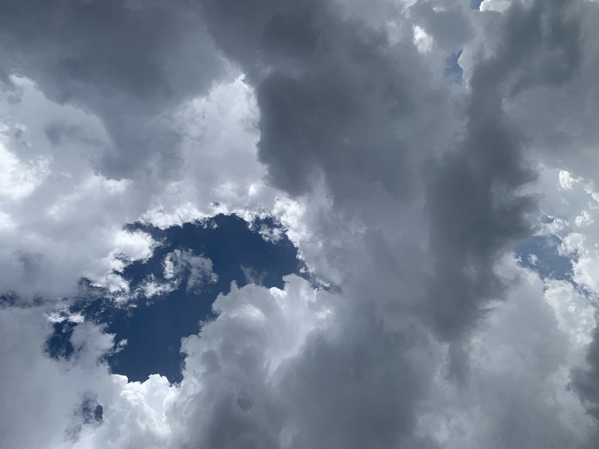 Stormy skies build over Plateau State villages, peppers at a rural market