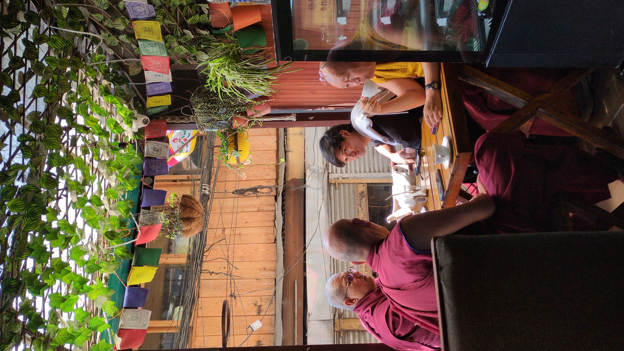 Buddhist monks spotted dining and walking in Bhagsu, India