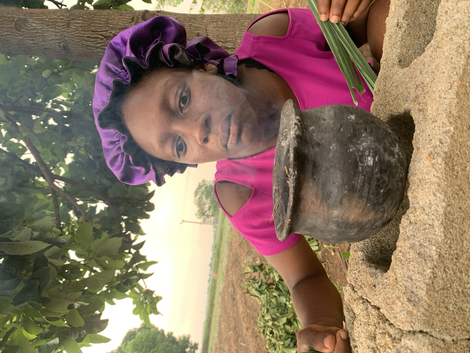 Woman cooks with leaves, climbs tree in Agban Nigeria