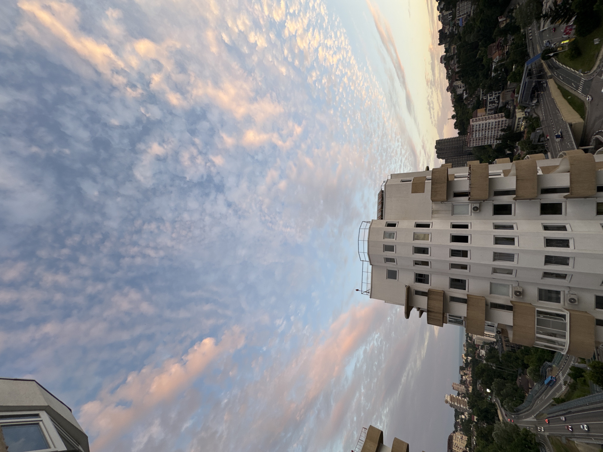 Sochi cityscape: highways, apartment towers, and green hillsides